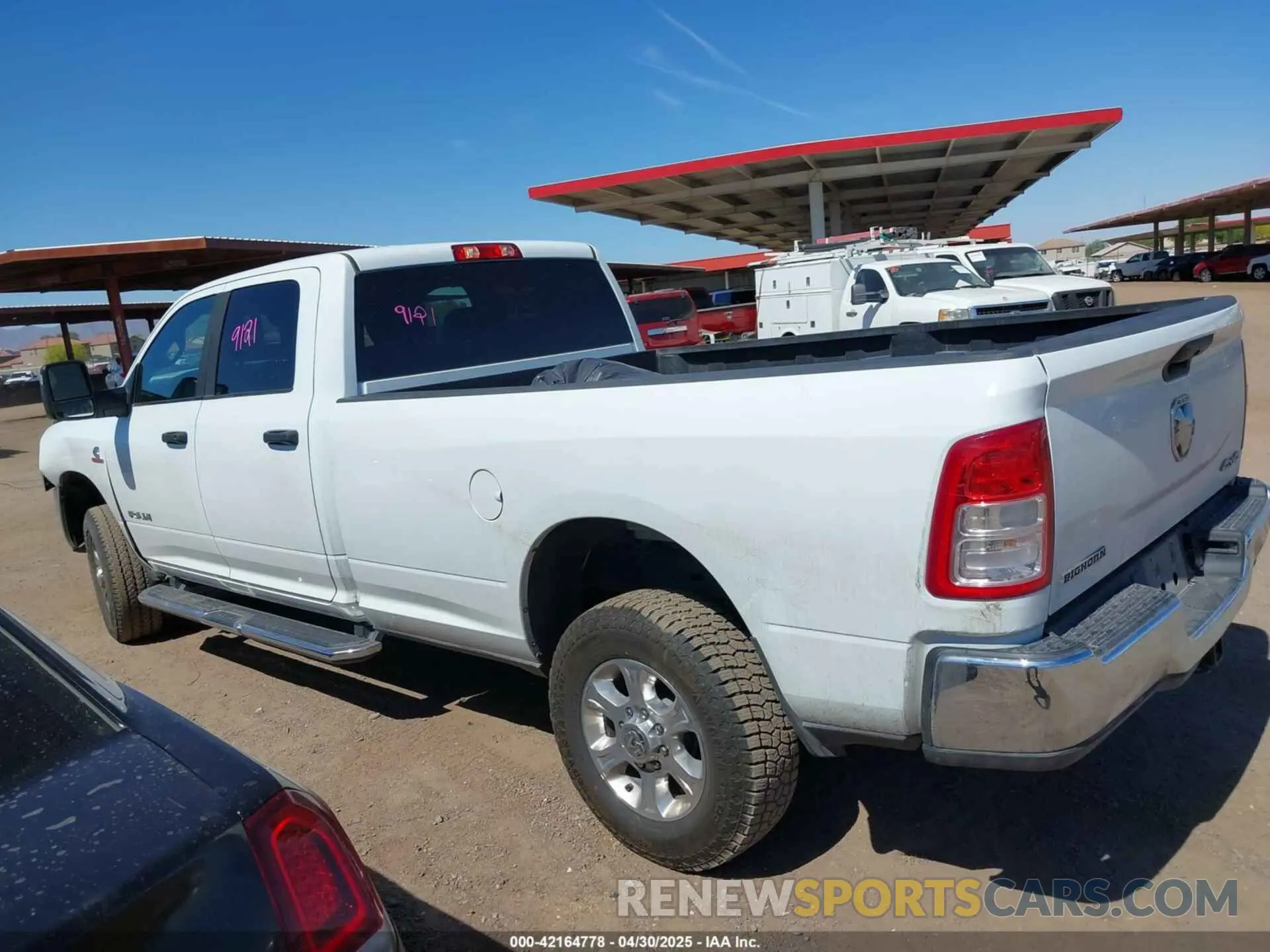 14 Photograph of a damaged car 3C6UR5JL2RG337668 RAM 2500 2024