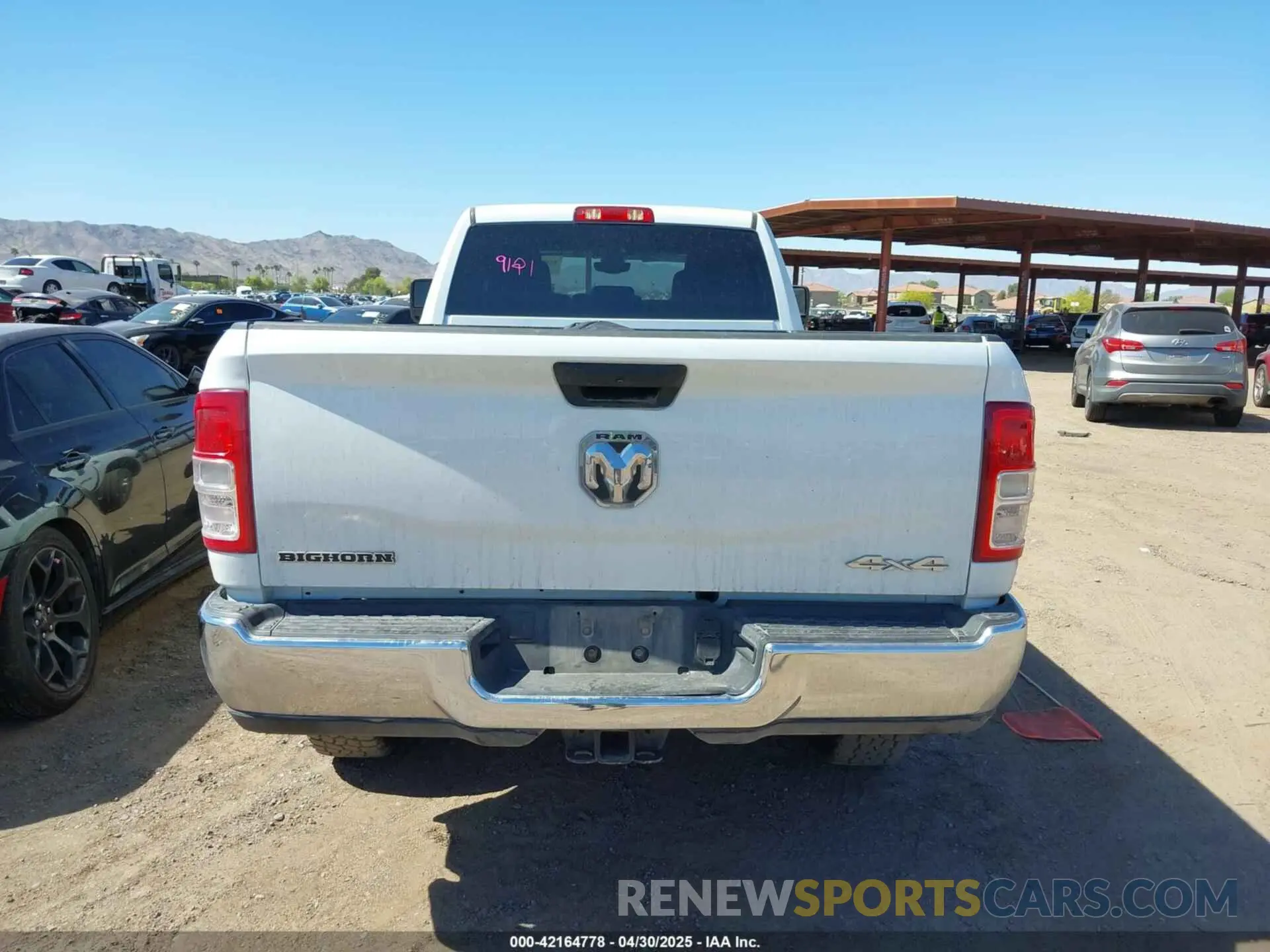 16 Photograph of a damaged car 3C6UR5JL2RG337668 RAM 2500 2024