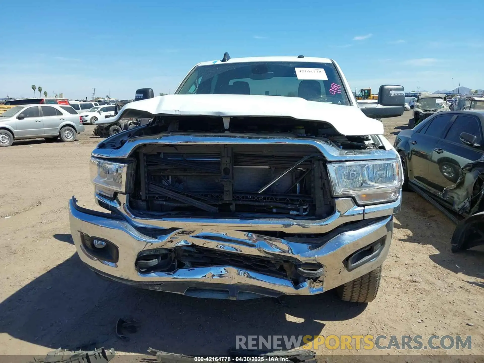 6 Photograph of a damaged car 3C6UR5JL2RG337668 RAM 2500 2024
