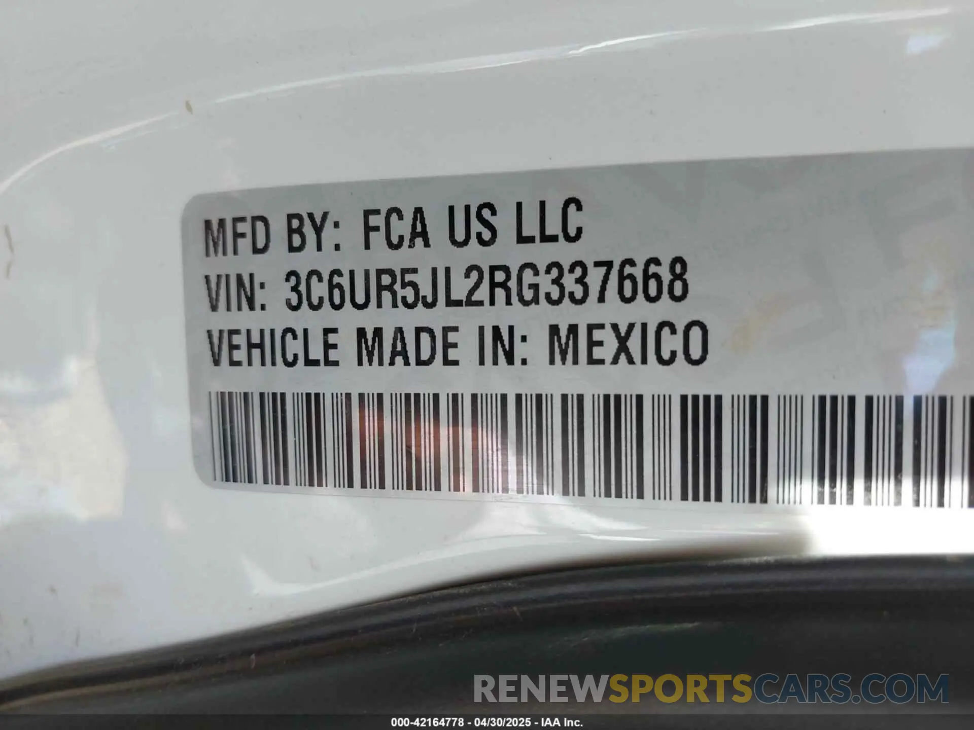9 Photograph of a damaged car 3C6UR5JL2RG337668 RAM 2500 2024