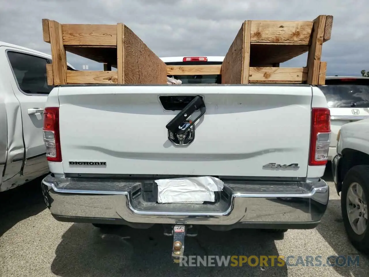 6 Photograph of a damaged car 3C6UR5JL4RG340622 RAM 2500 2024