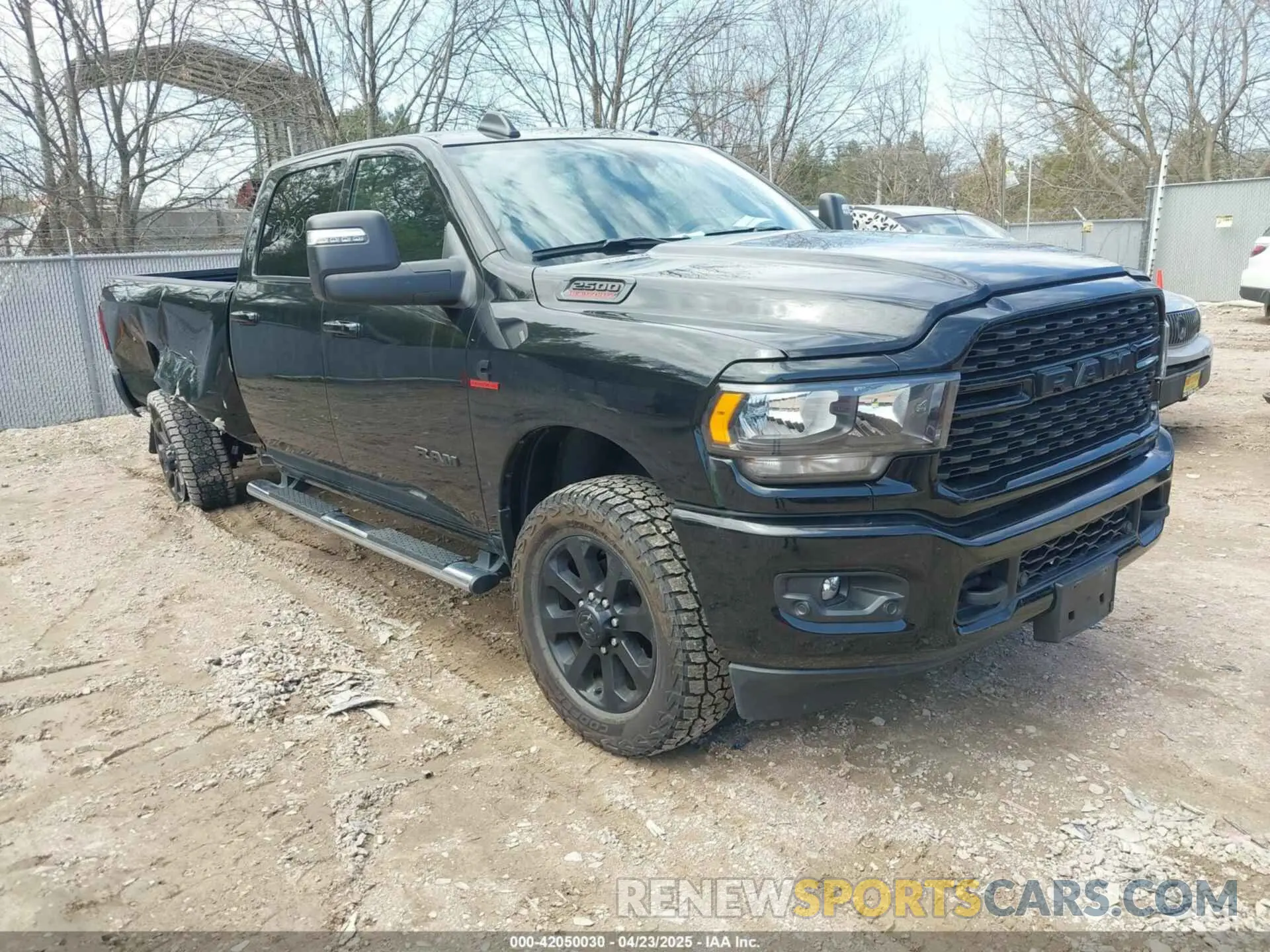 1 Photograph of a damaged car 3C6UR5JLXRG315028 RAM 2500 2024