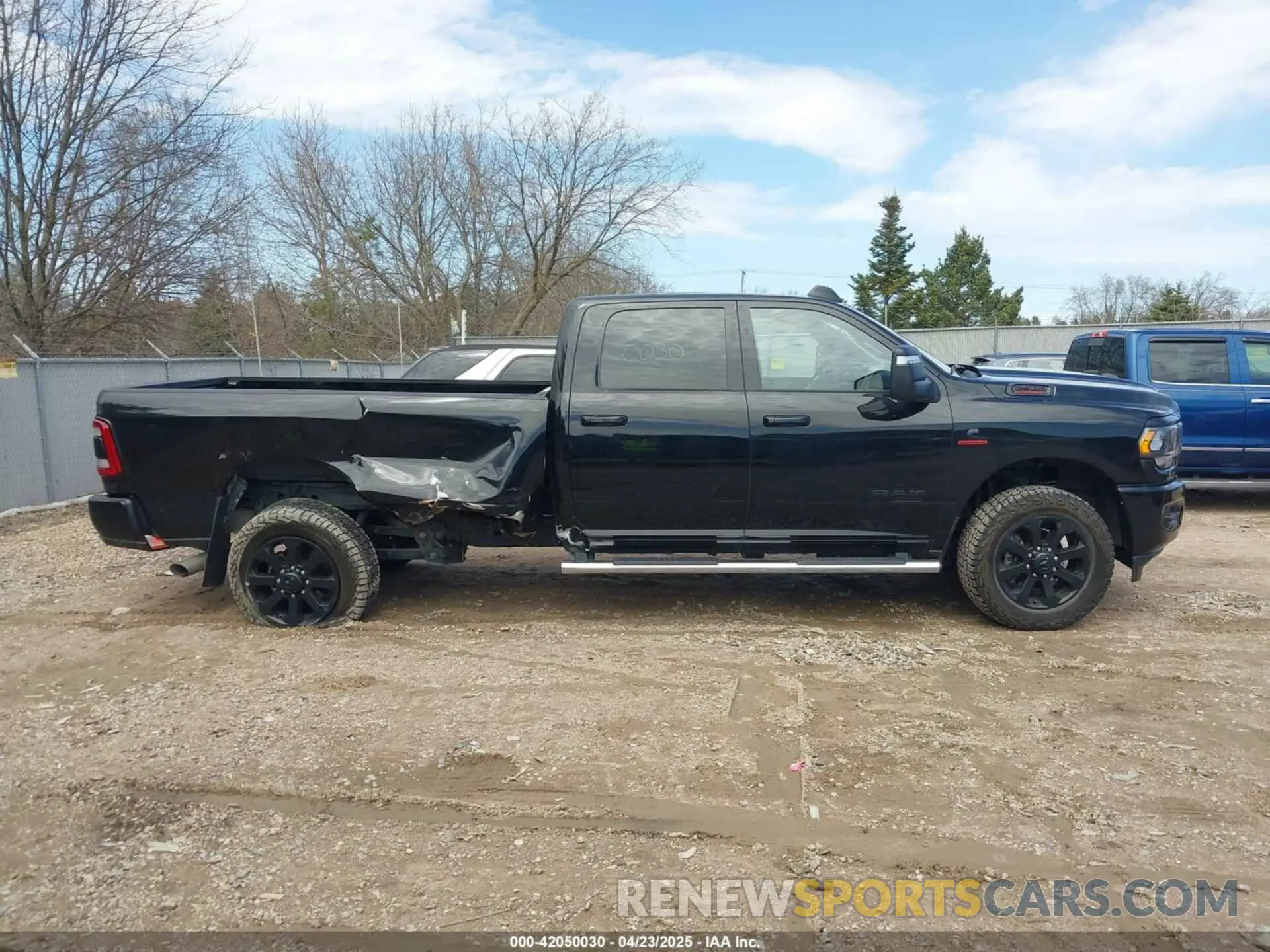 14 Photograph of a damaged car 3C6UR5JLXRG315028 RAM 2500 2024