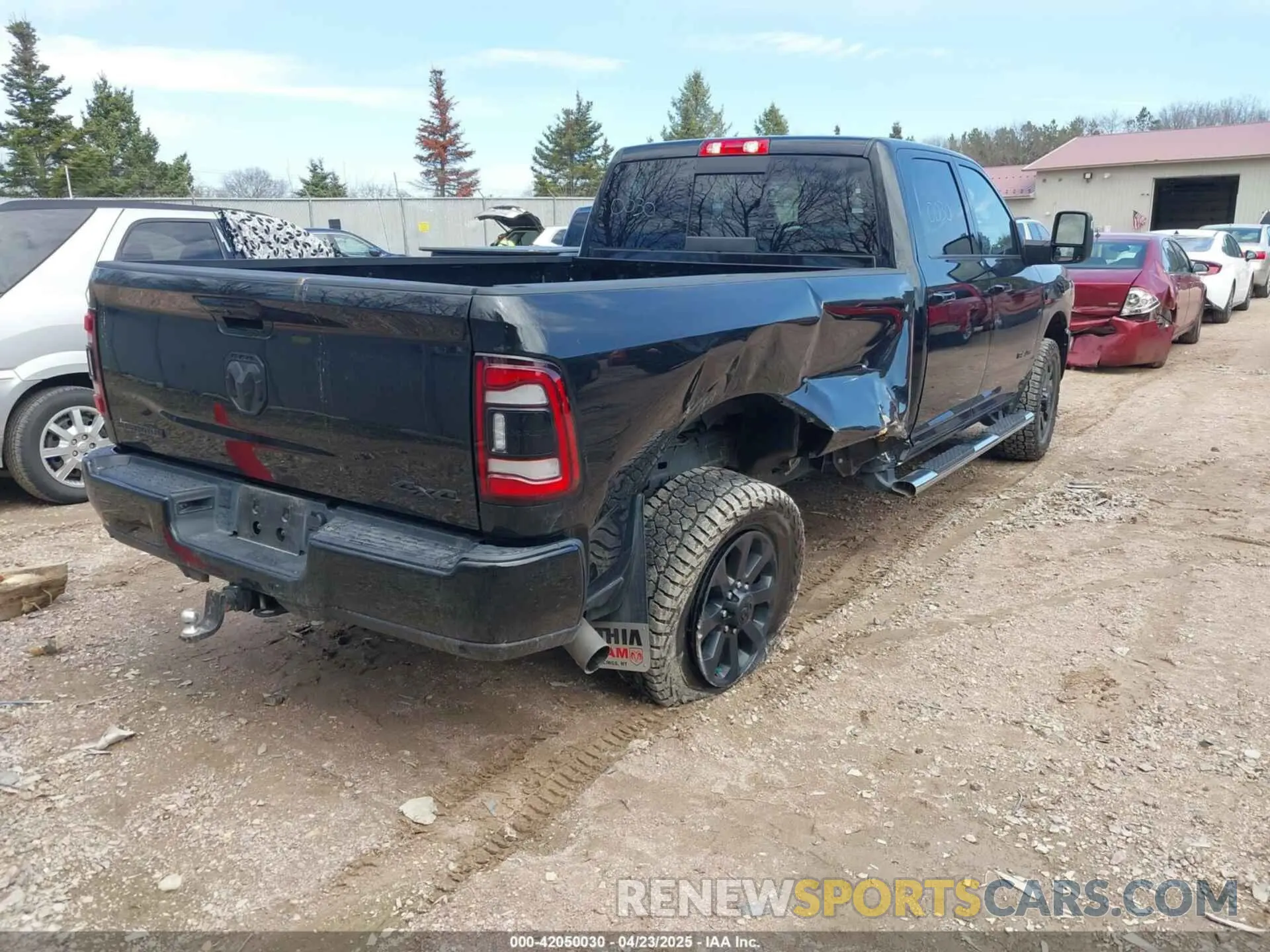 4 Photograph of a damaged car 3C6UR5JLXRG315028 RAM 2500 2024