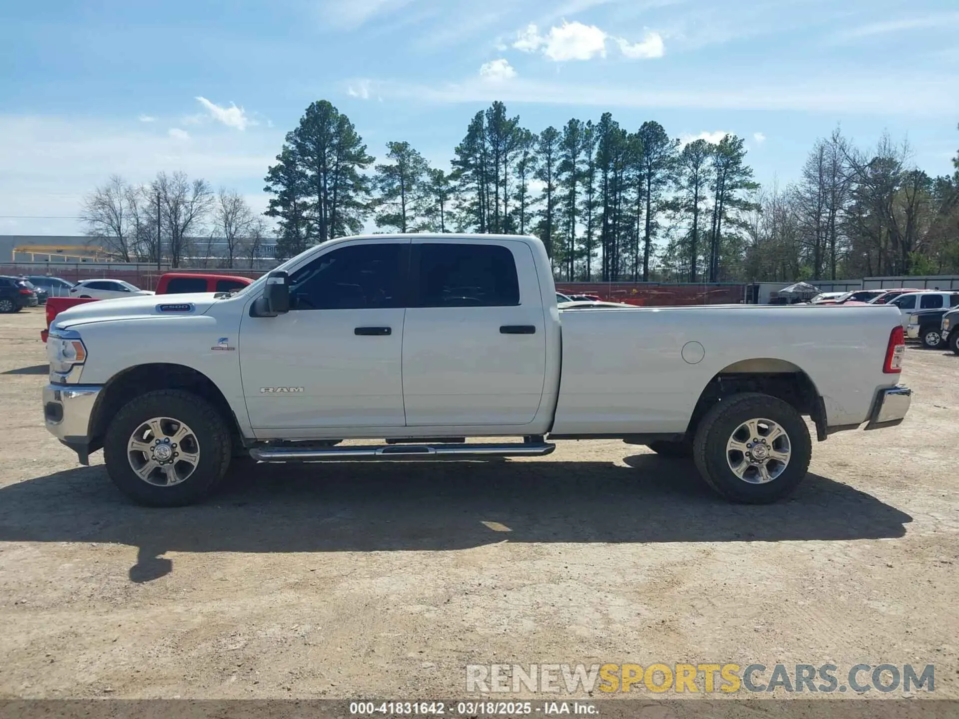 14 Photograph of a damaged car 3C6UR5JLXRG340205 RAM 2500 2024