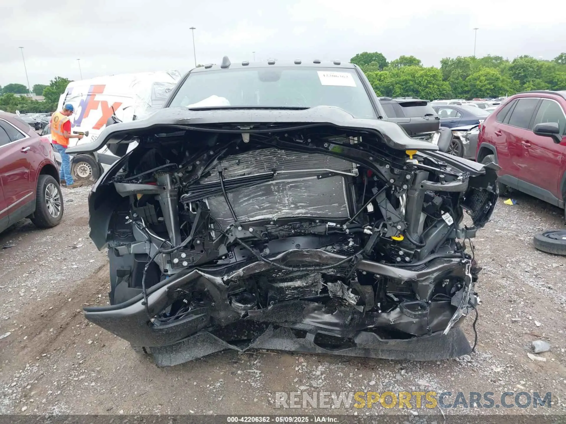 6 Photograph of a damaged car 3C6UR5NL0RG329918 RAM 2500 2024