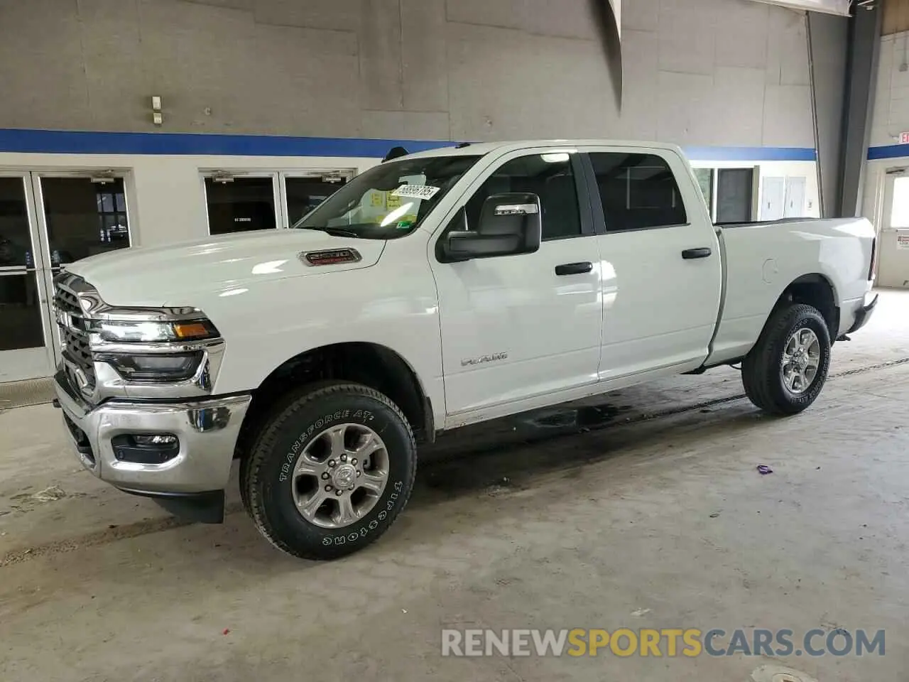 1 Photograph of a damaged car 3C6UR5DJ7SG519303 RAM 2500 2025