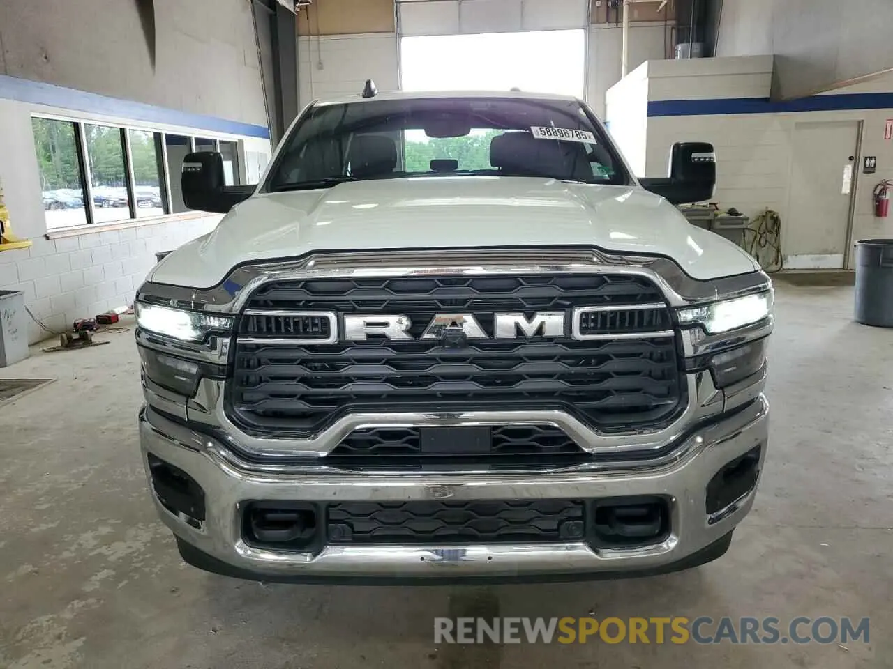 5 Photograph of a damaged car 3C6UR5DJ7SG519303 RAM 2500 2025