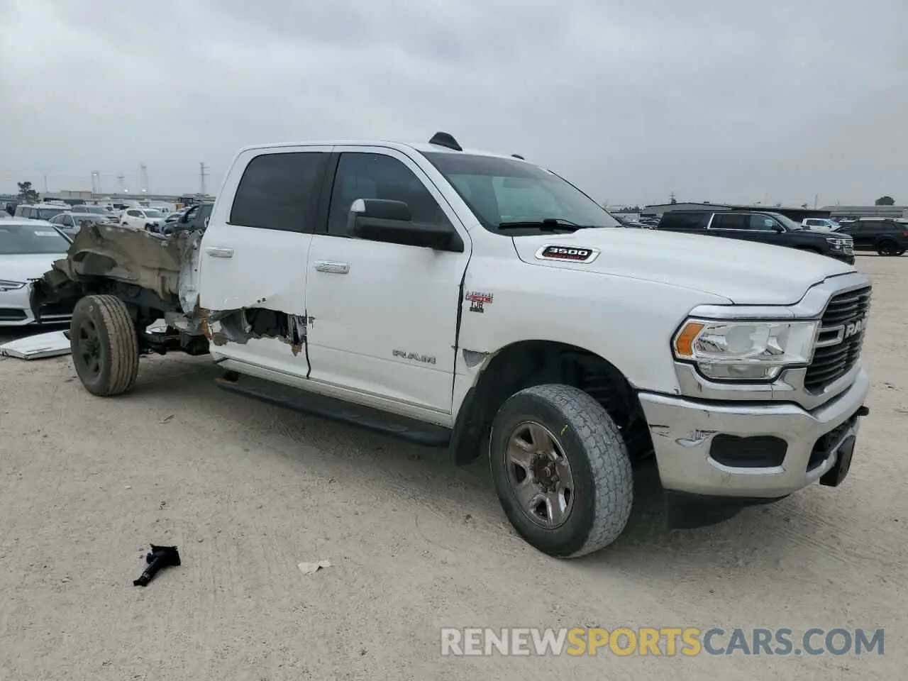 4 Photograph of a damaged car 3C63R3HJ1KG604809 RAM 3500 2019