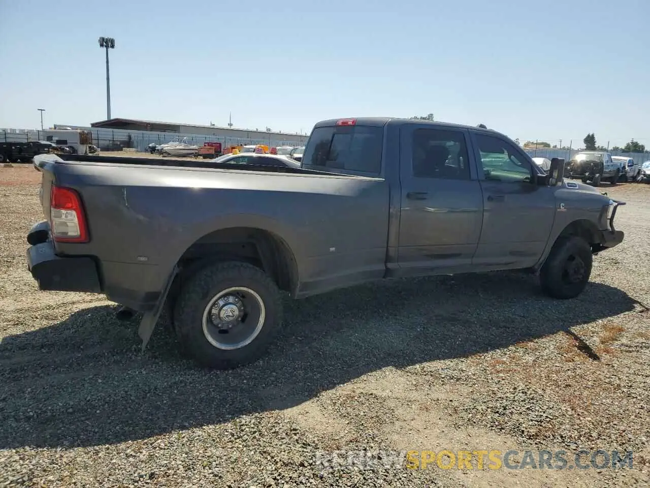 3 Photograph of a damaged car 3C63RRGL1KG692203 RAM 3500 2019