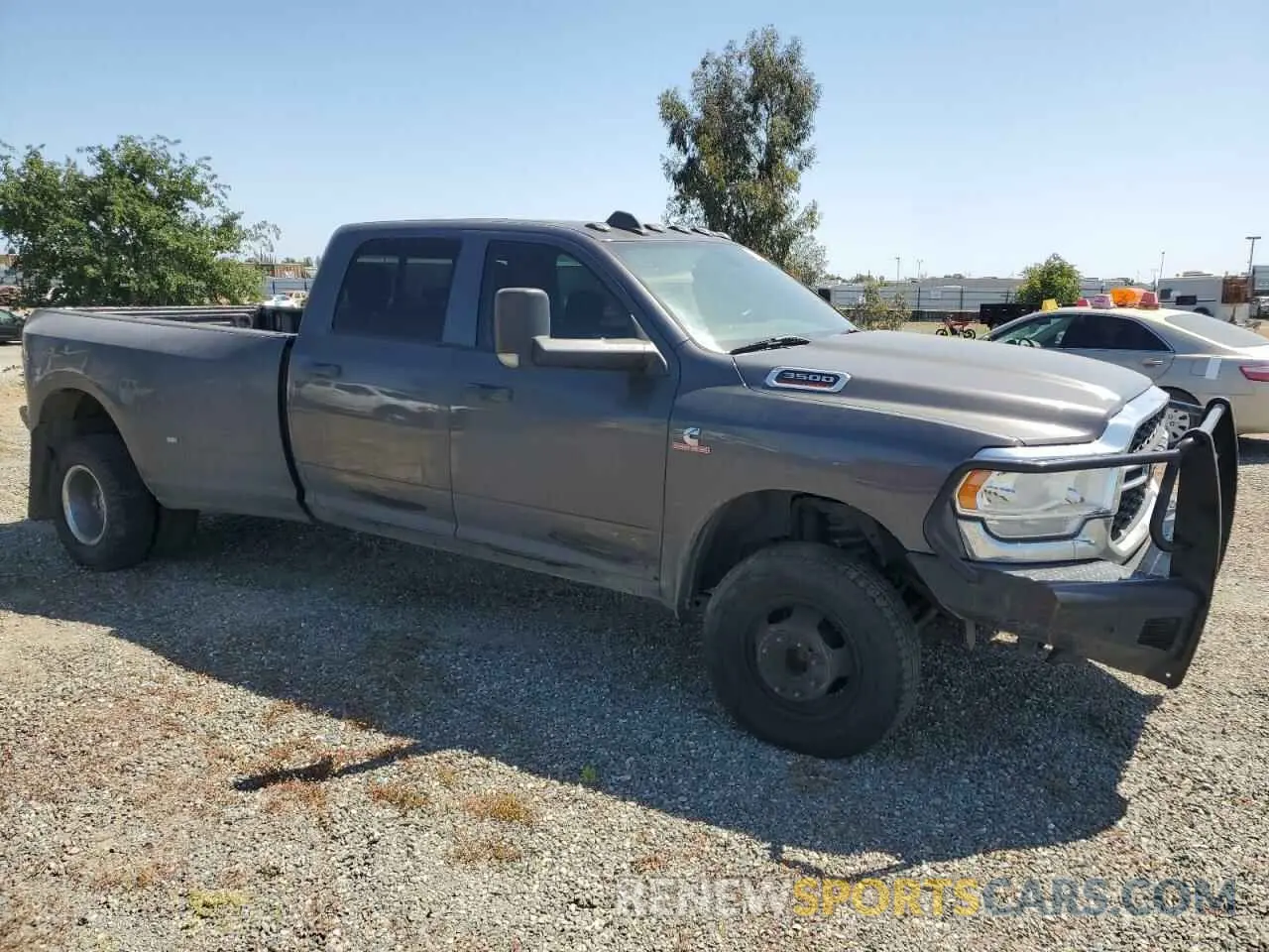4 Photograph of a damaged car 3C63RRGL1KG692203 RAM 3500 2019