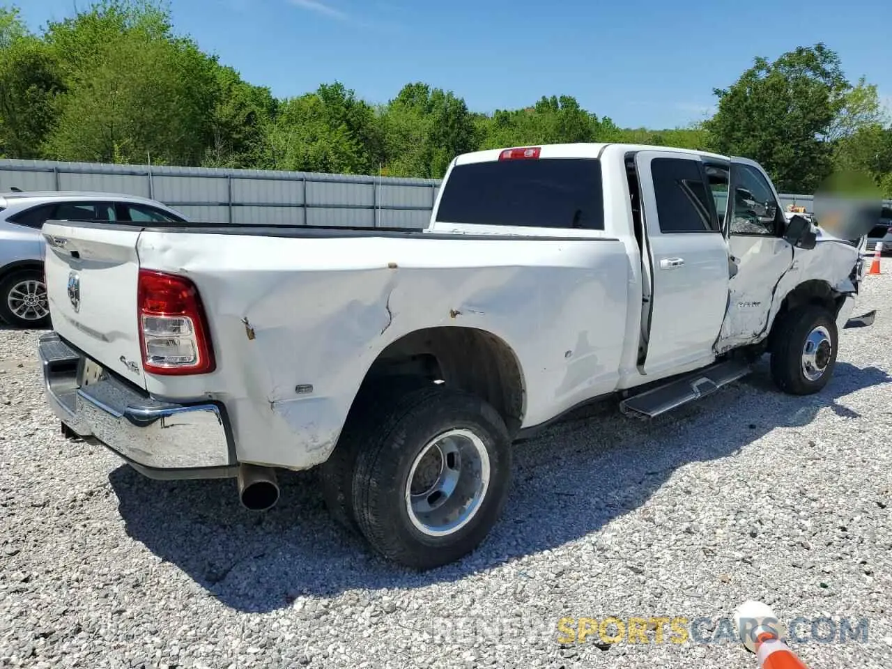 3 Photograph of a damaged car 3C63RRHL1KG724324 RAM 3500 2019