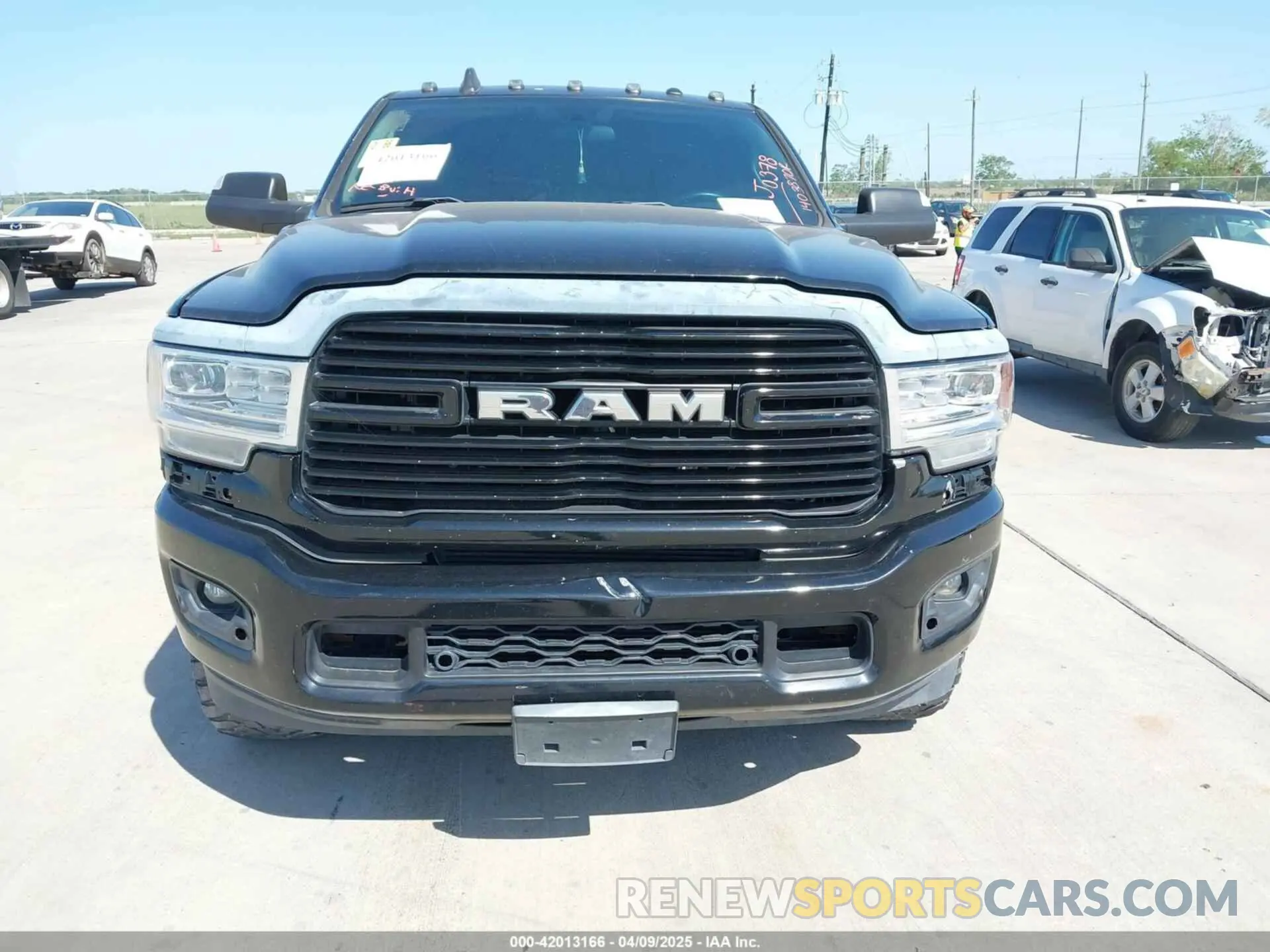 6 Photograph of a damaged car 3C63RPAL6LG184632 RAM 3500 2020