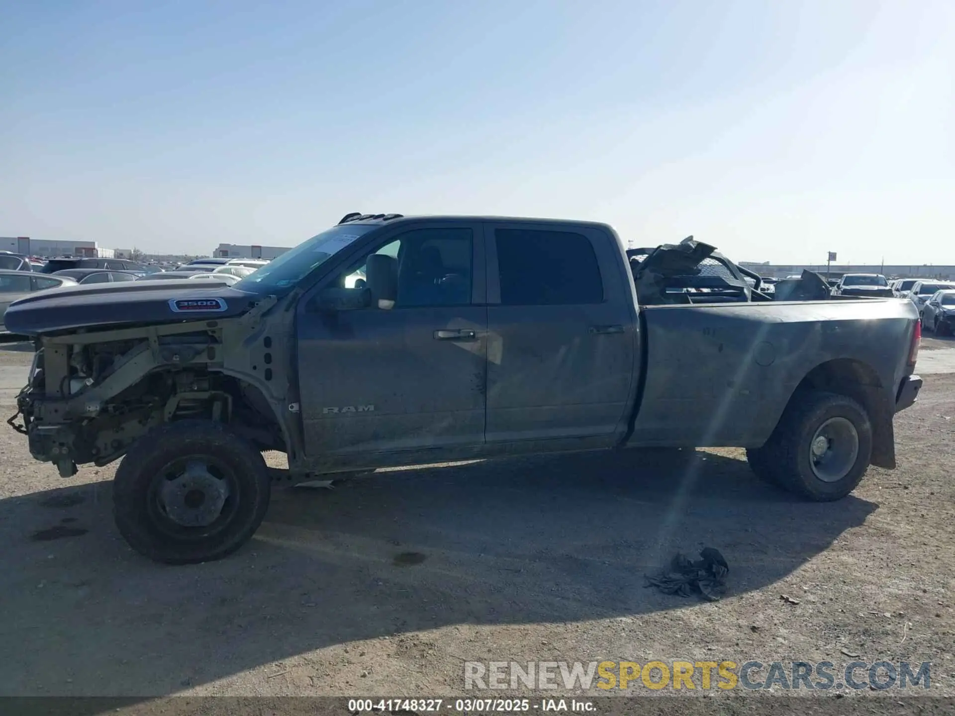 14 Photograph of a damaged car 3C63RRGL3LG241856 RAM 3500 2020