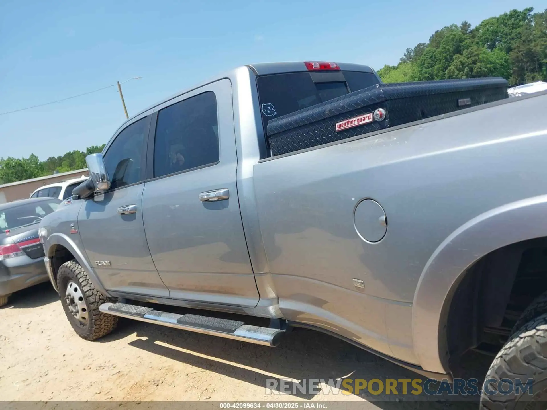 14 Photograph of a damaged car 3C63RRJL3LG179559 RAM 3500 2020