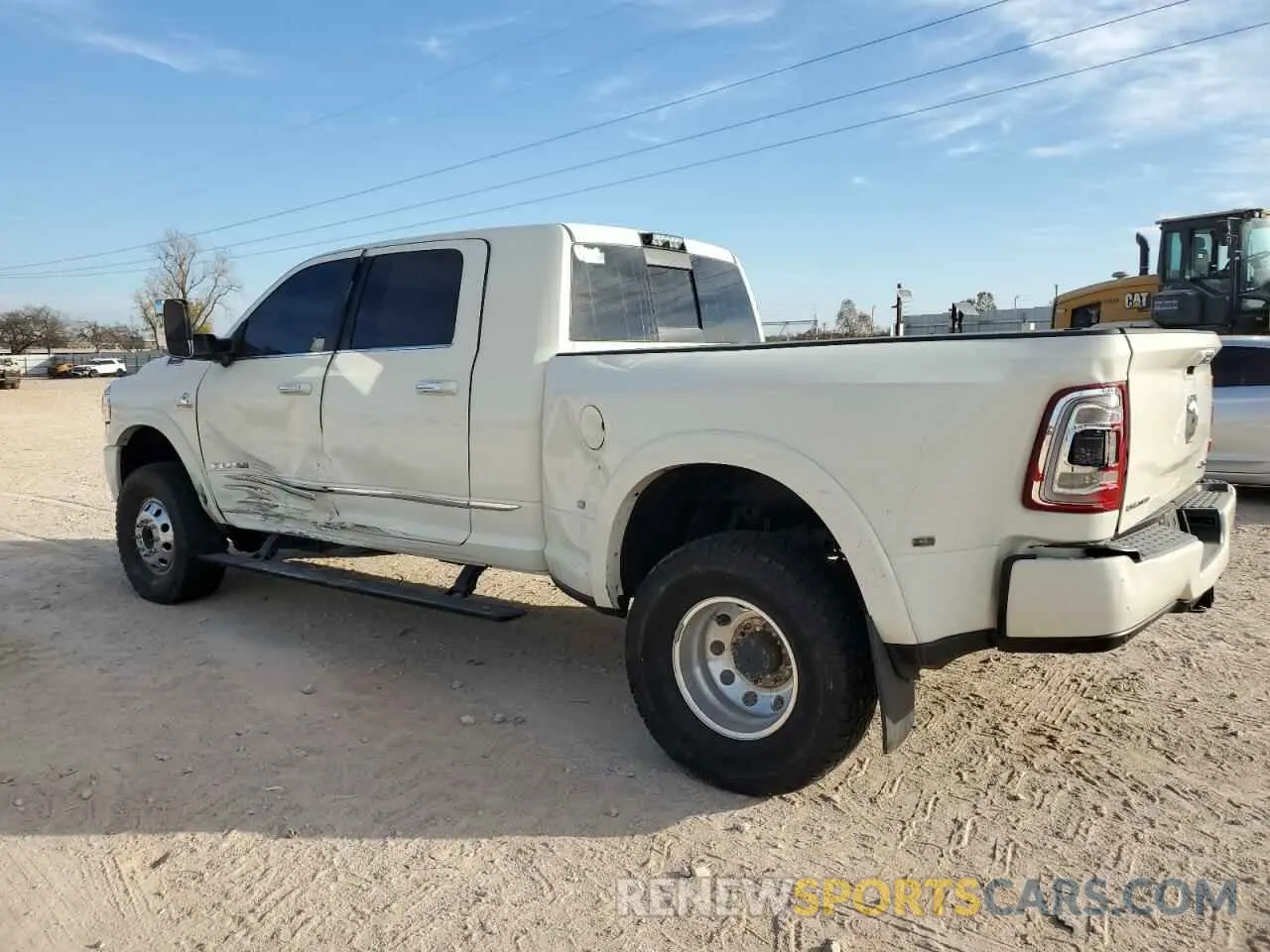 2 Photograph of a damaged car 3C63RRPL5LG198282 RAM 3500 2020
