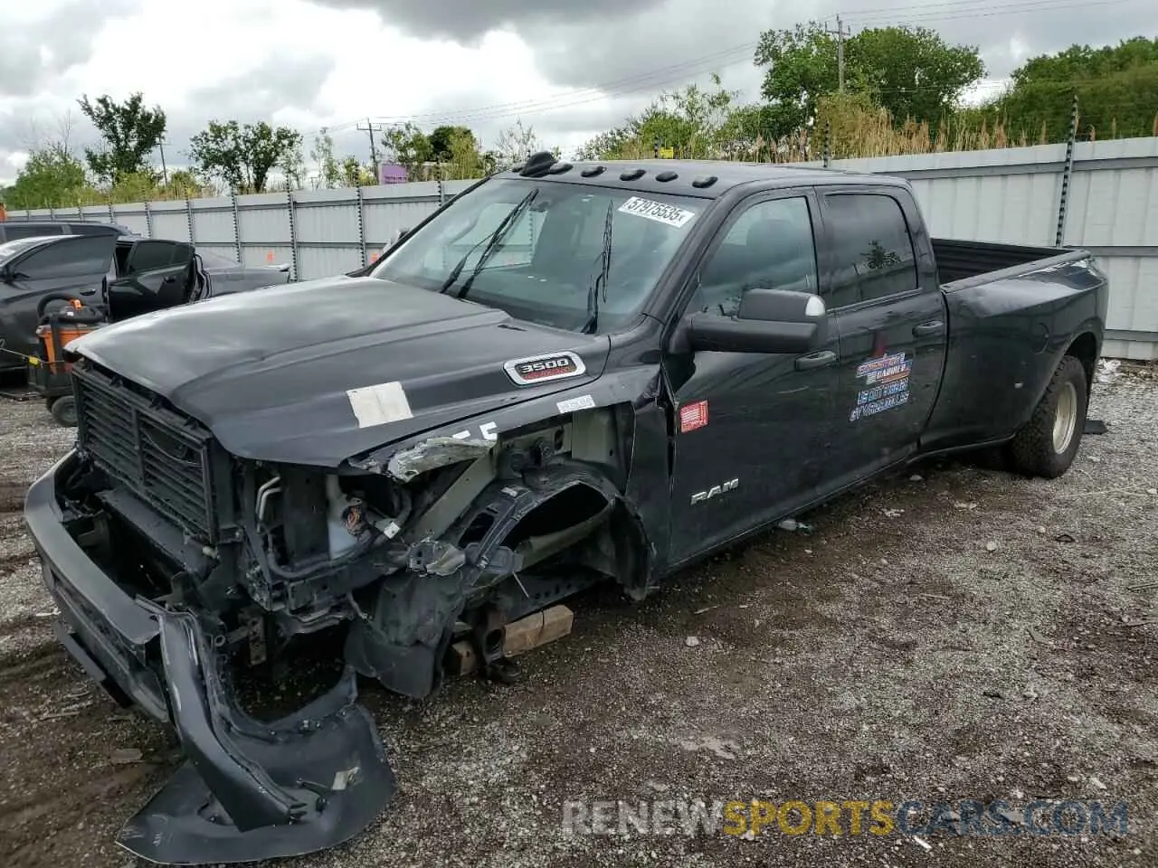 1 Photograph of a damaged car 3C63RRGL0MG528007 RAM 3500 2021
