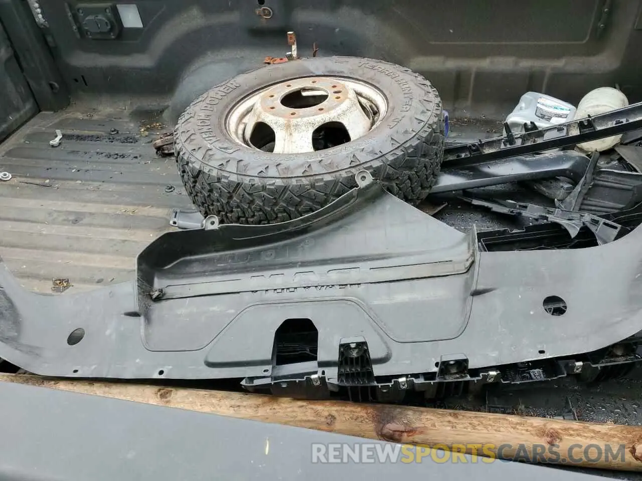 12 Photograph of a damaged car 3C63RRGL0MG528007 RAM 3500 2021