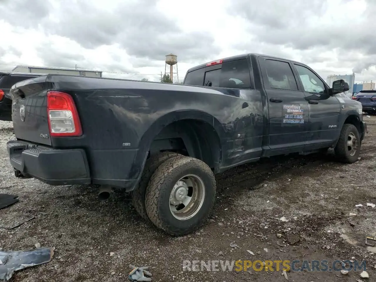 3 Photograph of a damaged car 3C63RRGL0MG528007 RAM 3500 2021