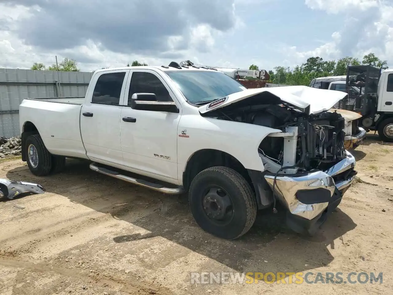 4 Photograph of a damaged car 3C63RRGL2MG565608 RAM 3500 2021