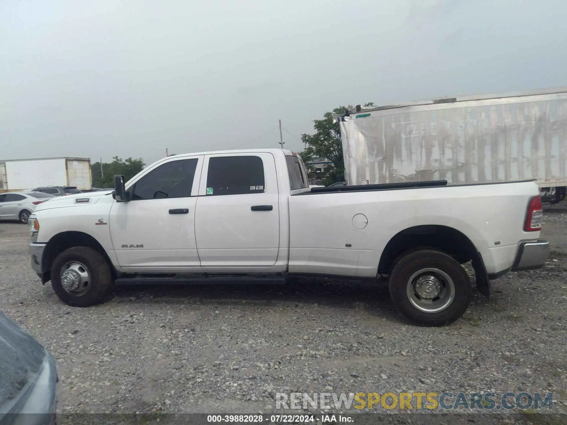 14 Photograph of a damaged car 3C63RRGL8MG665955 RAM 3500 2021