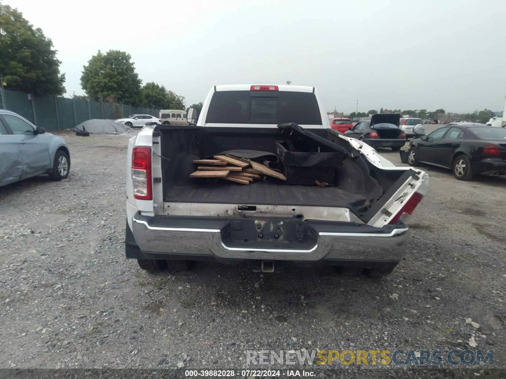 15 Photograph of a damaged car 3C63RRGL8MG665955 RAM 3500 2021
