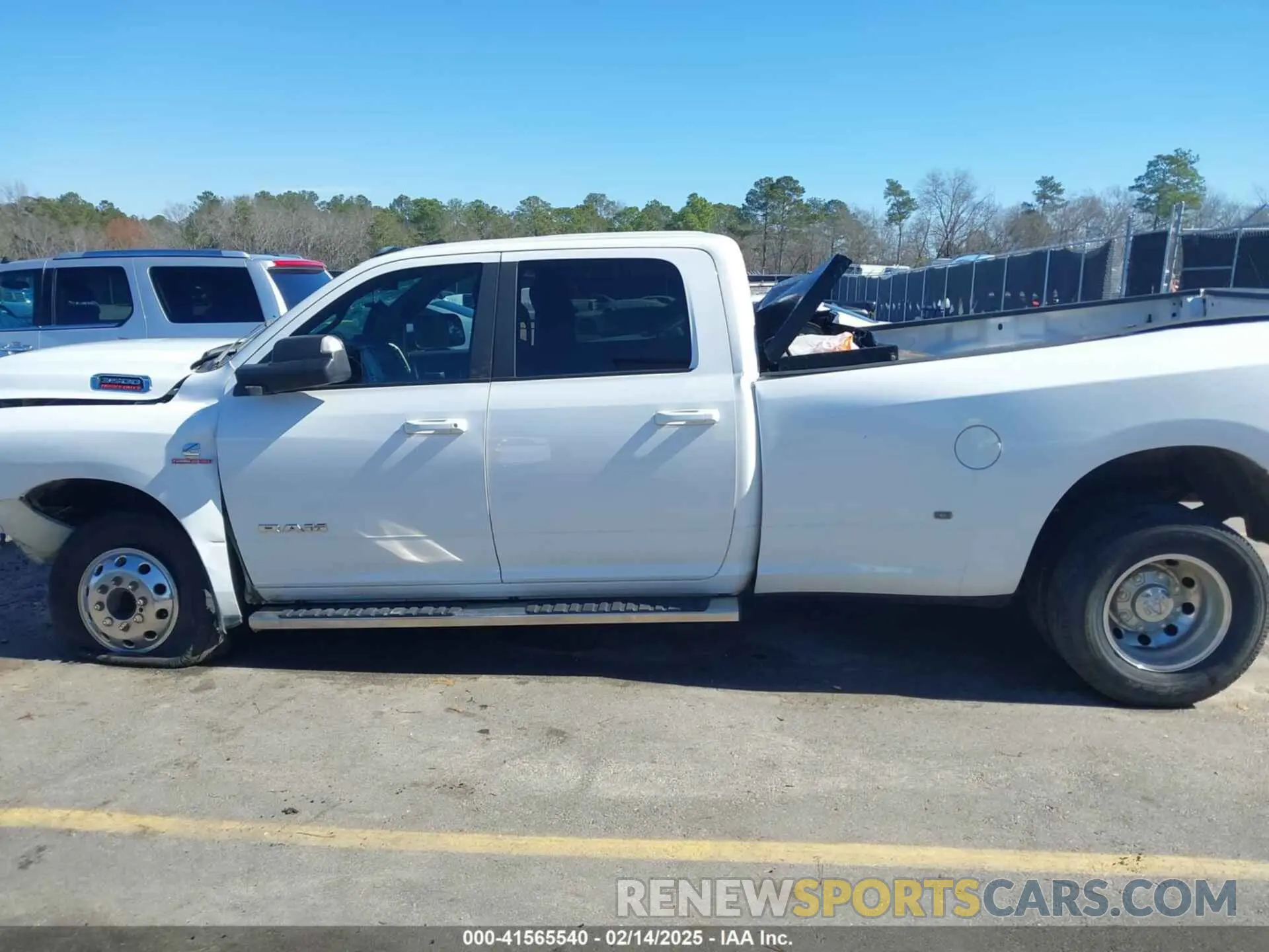 14 Photograph of a damaged car 3C63RRHL3MG642629 RAM 3500 2021