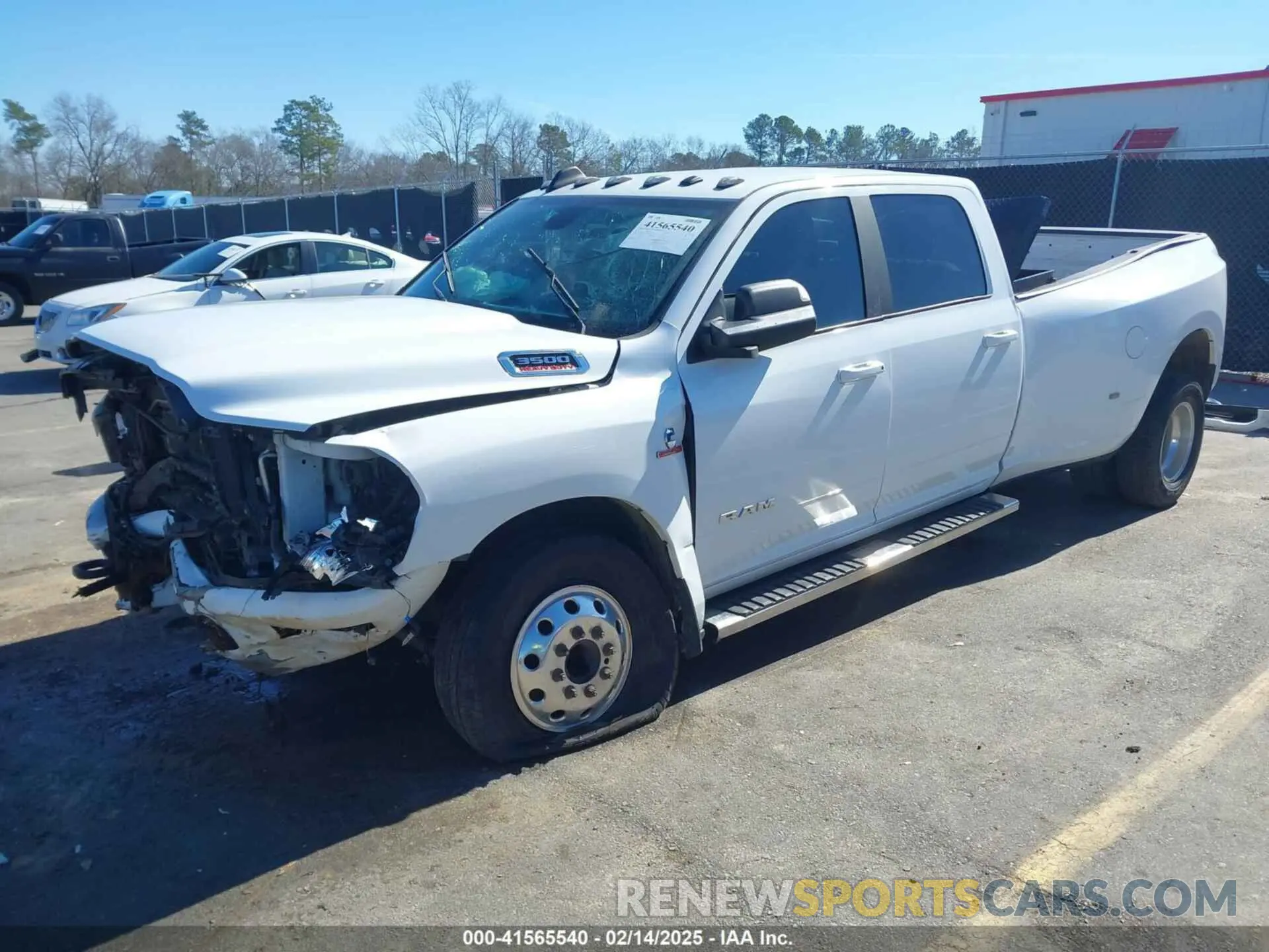 2 Photograph of a damaged car 3C63RRHL3MG642629 RAM 3500 2021