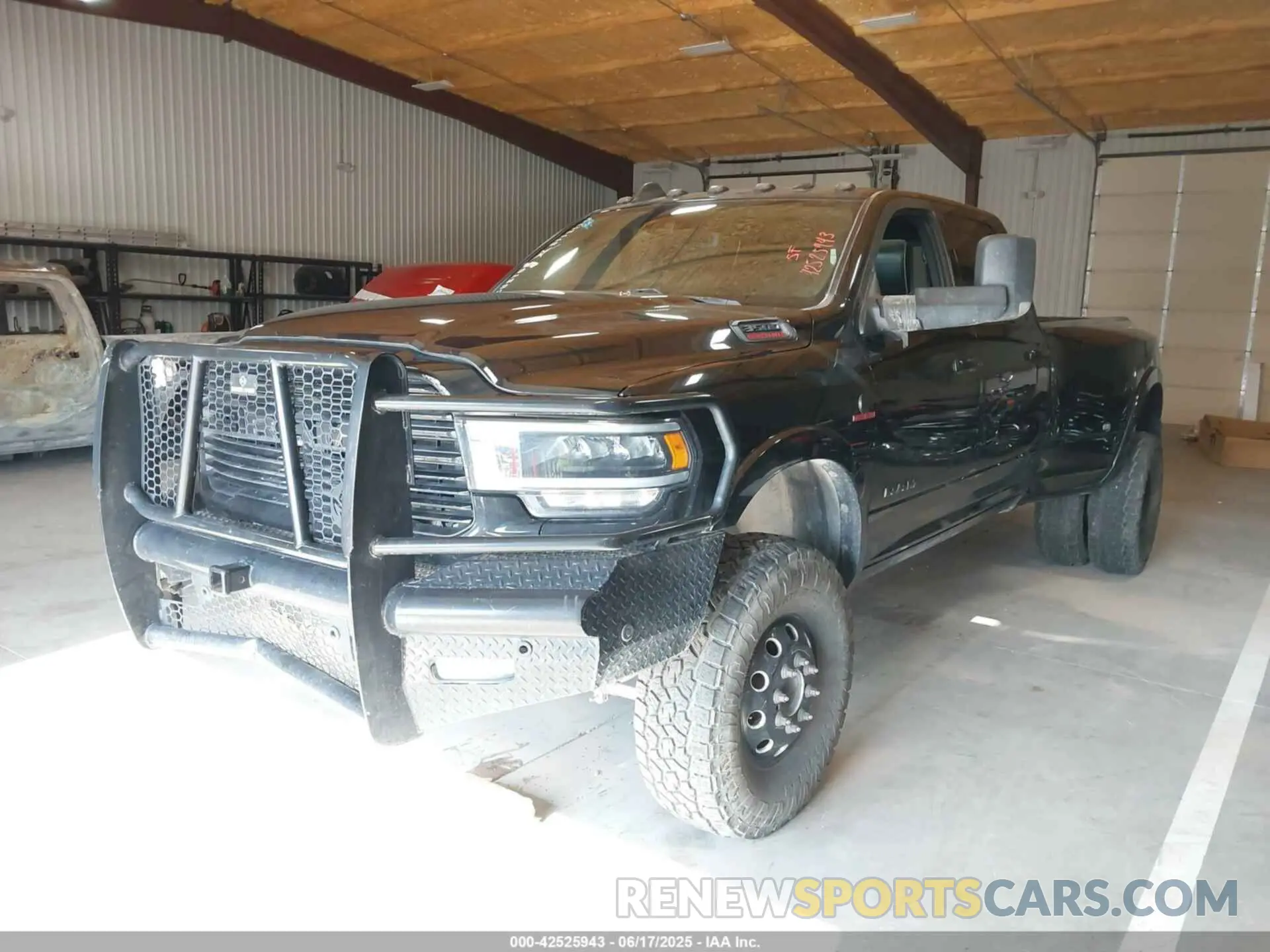 2 Photograph of a damaged car 3C63RRJL7MG550174 RAM 3500 2021
