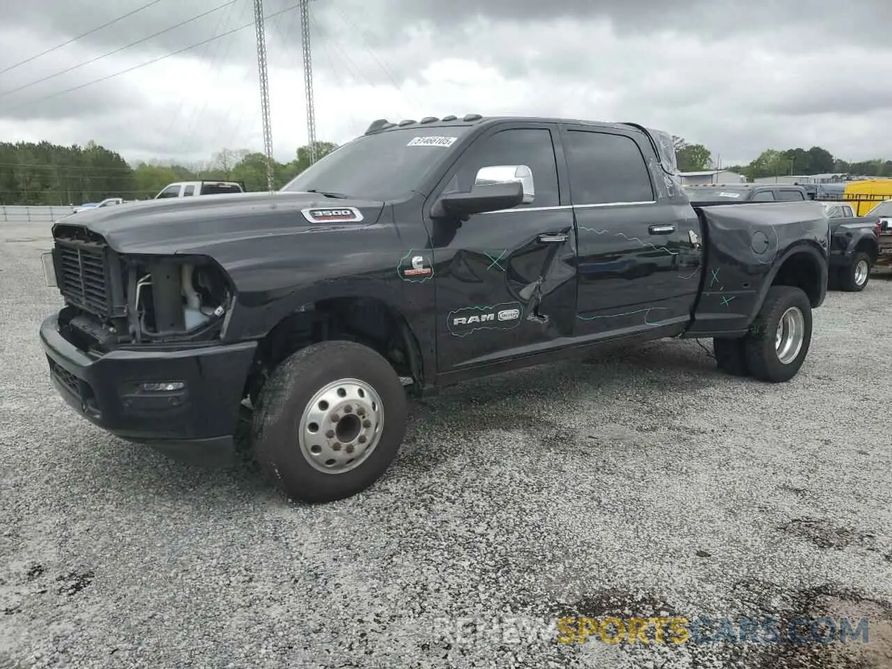 1 Photograph of a damaged car 3C63RRNL0MG688777 RAM 3500 2021