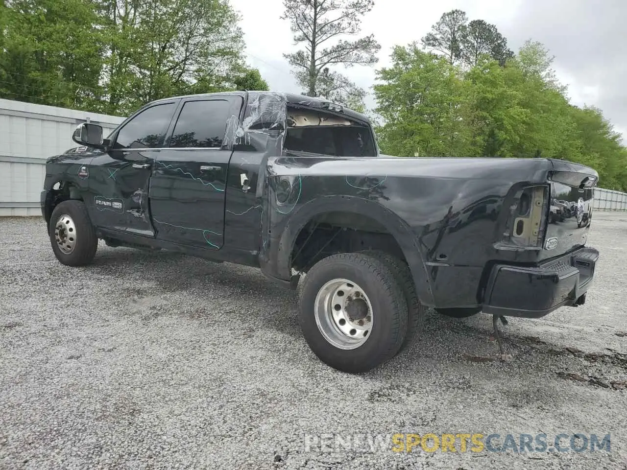 2 Photograph of a damaged car 3C63RRNL0MG688777 RAM 3500 2021
