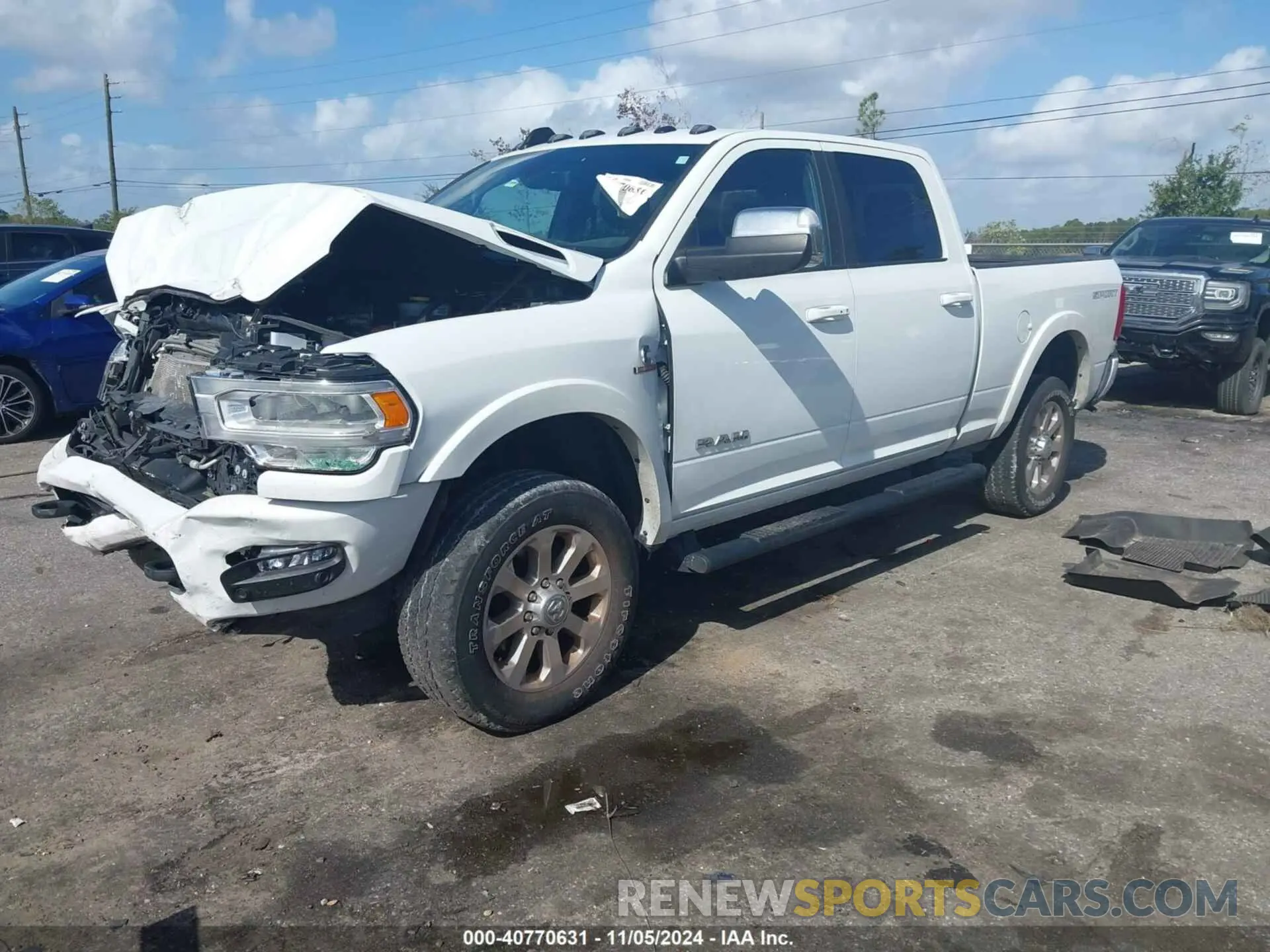 2 Photograph of a damaged car 3C63R3EL3NG353074 RAM 3500 2022