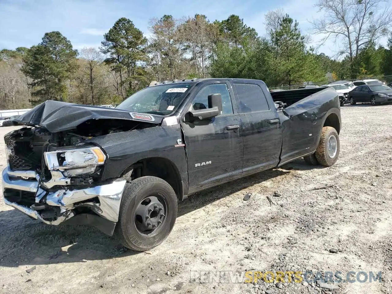 1 Photograph of a damaged car 3C63RRGL2NG293403 RAM 3500 2022