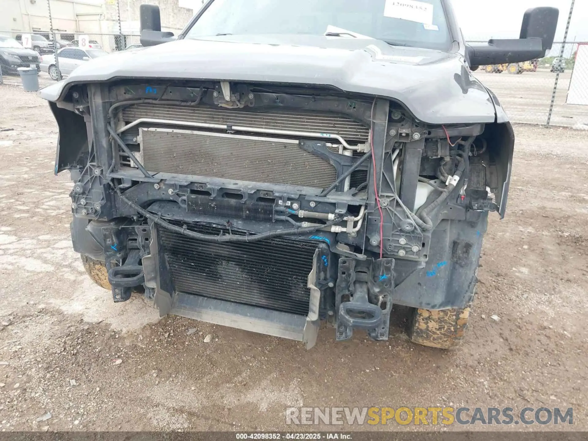 11 Photograph of a damaged car 3C63RRGL3NG177594 RAM 3500 2022