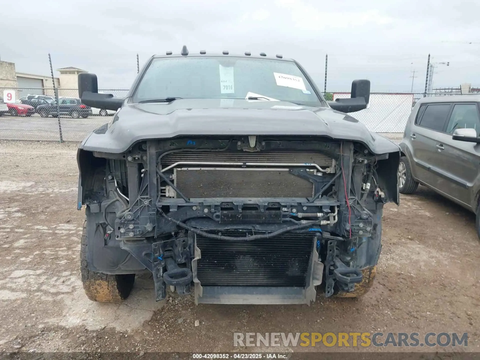 13 Photograph of a damaged car 3C63RRGL3NG177594 RAM 3500 2022