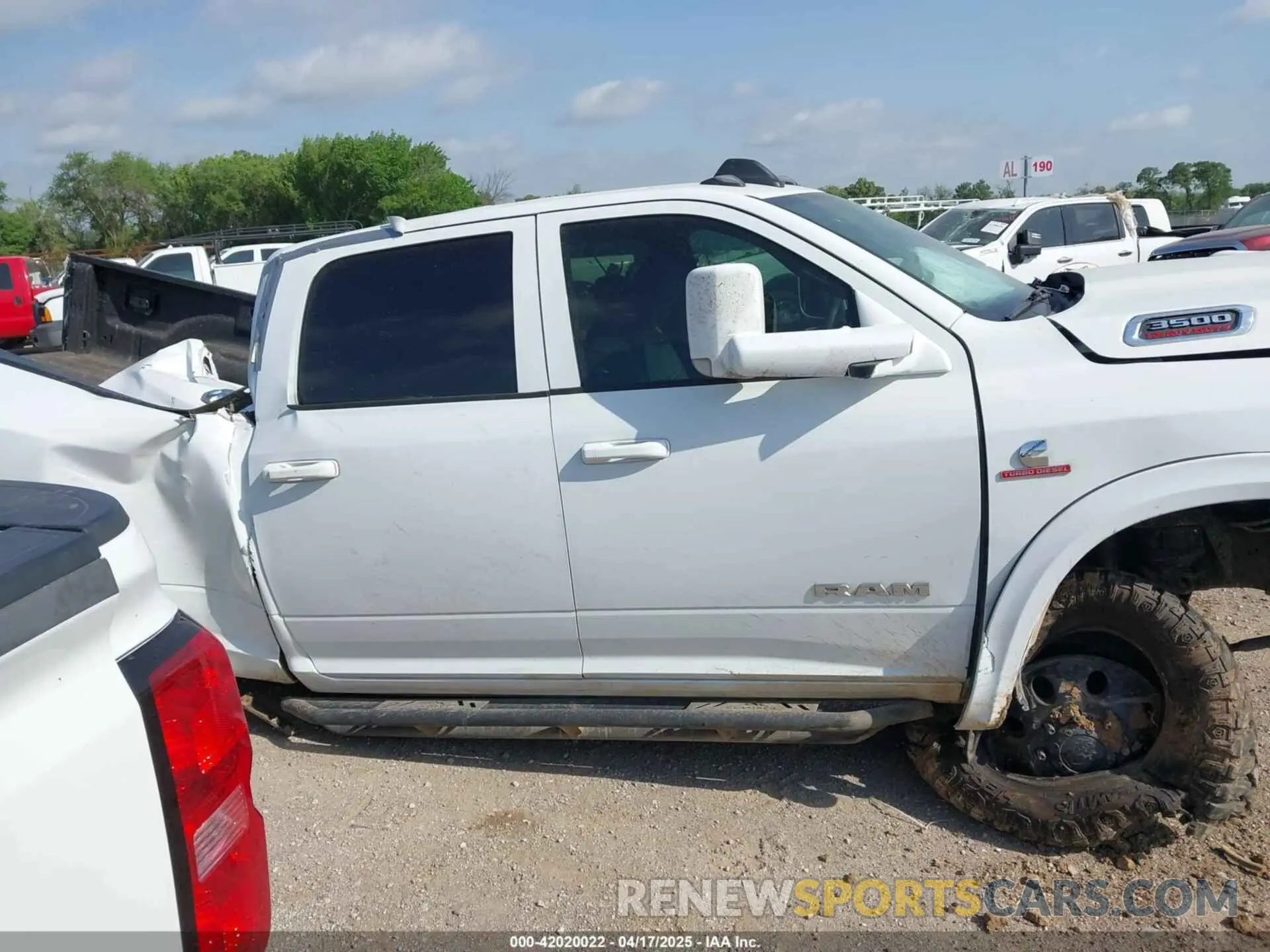 13 Photograph of a damaged car 3C63RRGL5NG342187 RAM 3500 2022