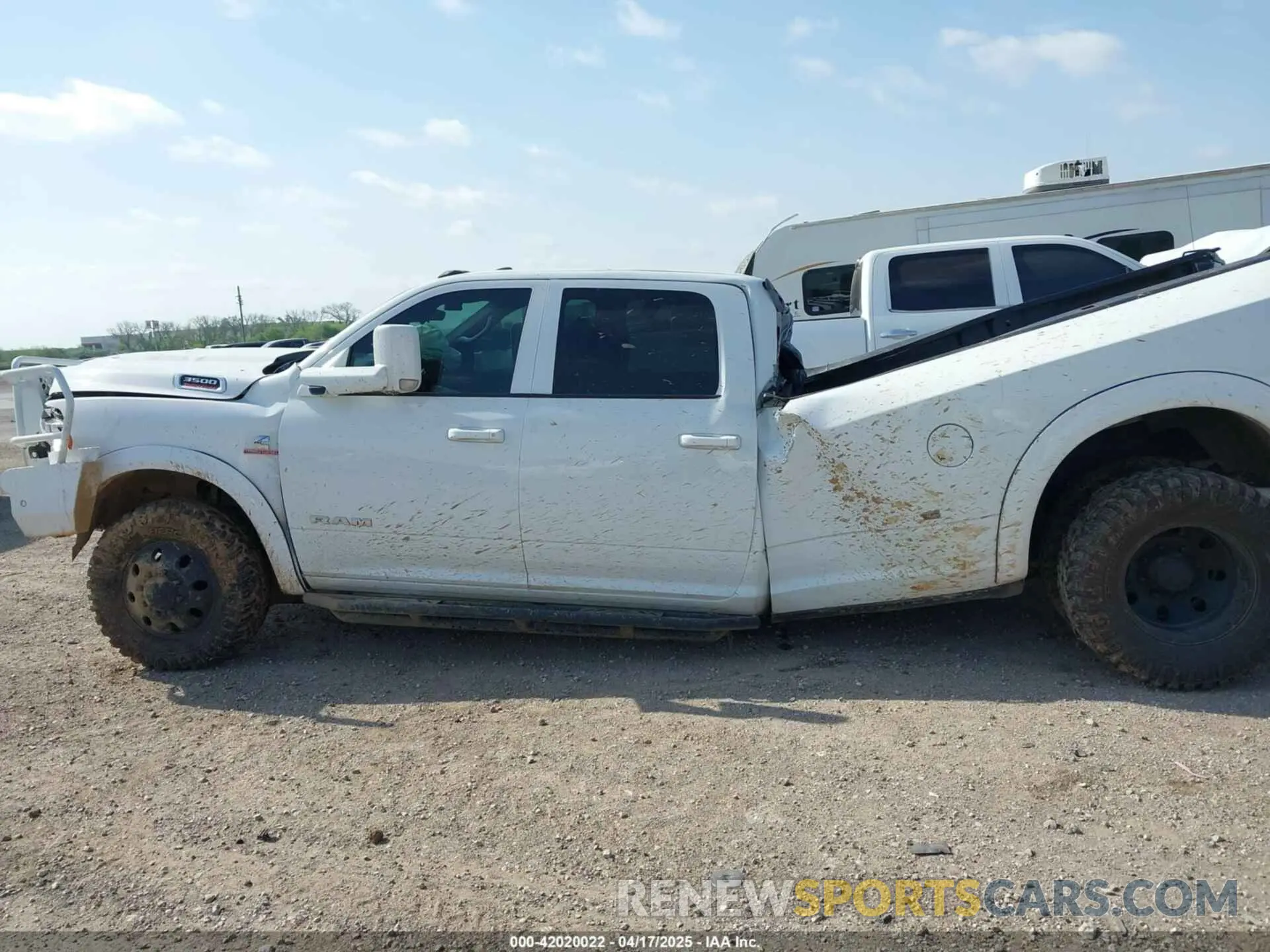 14 Photograph of a damaged car 3C63RRGL5NG342187 RAM 3500 2022