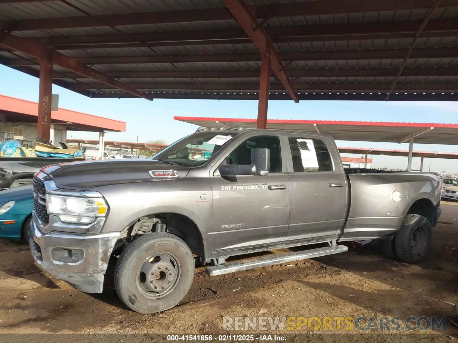 14 Photograph of a damaged car 3C63RRHL1NG189189 RAM 3500 2022