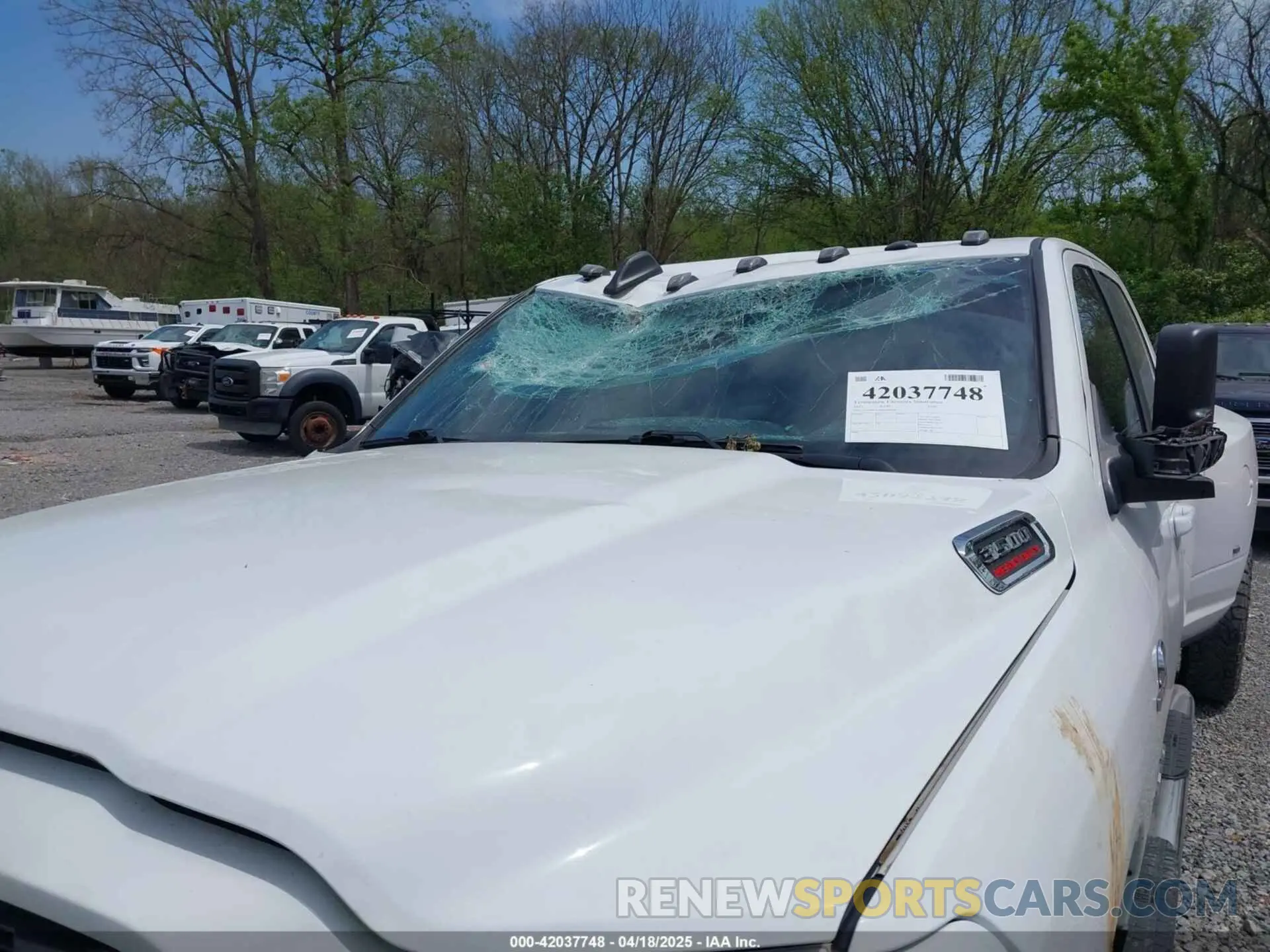 11 Photograph of a damaged car 3C63RRHL8NG164595 RAM 3500 2022