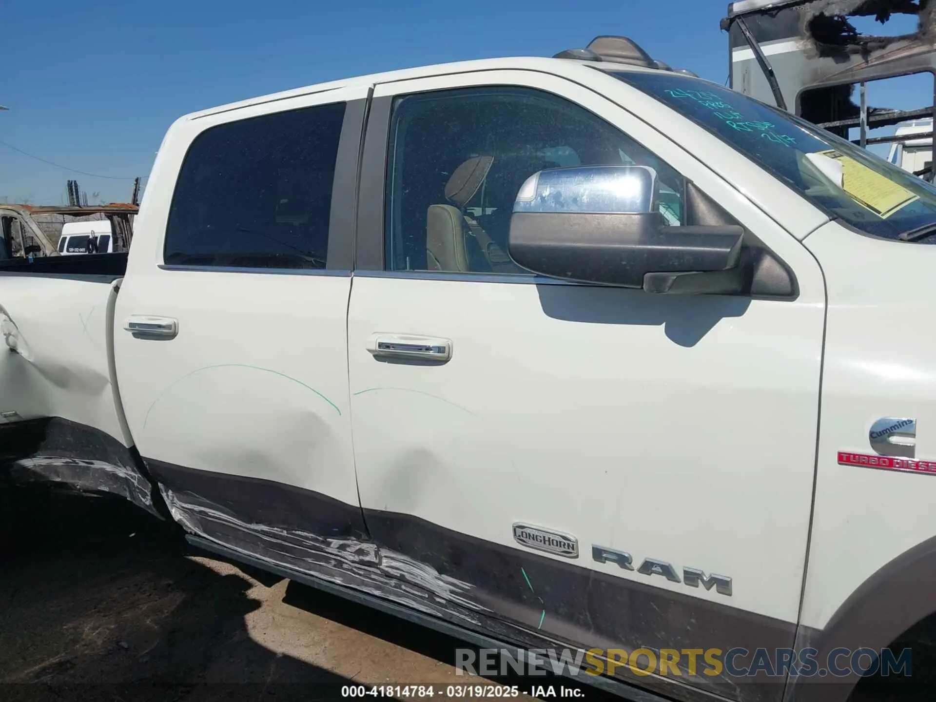13 Photograph of a damaged car 3C63RRKL2NG153245 RAM 3500 2022