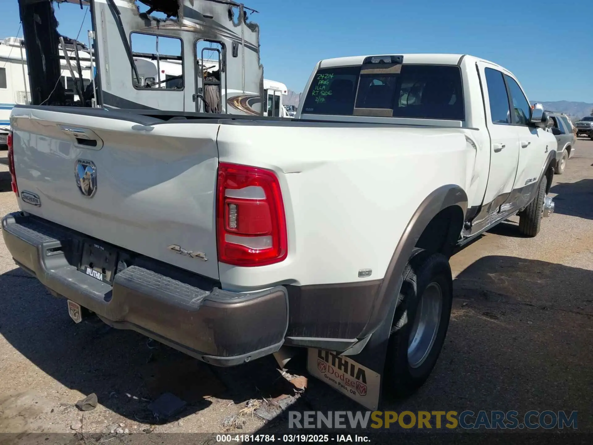 4 Photograph of a damaged car 3C63RRKL2NG153245 RAM 3500 2022
