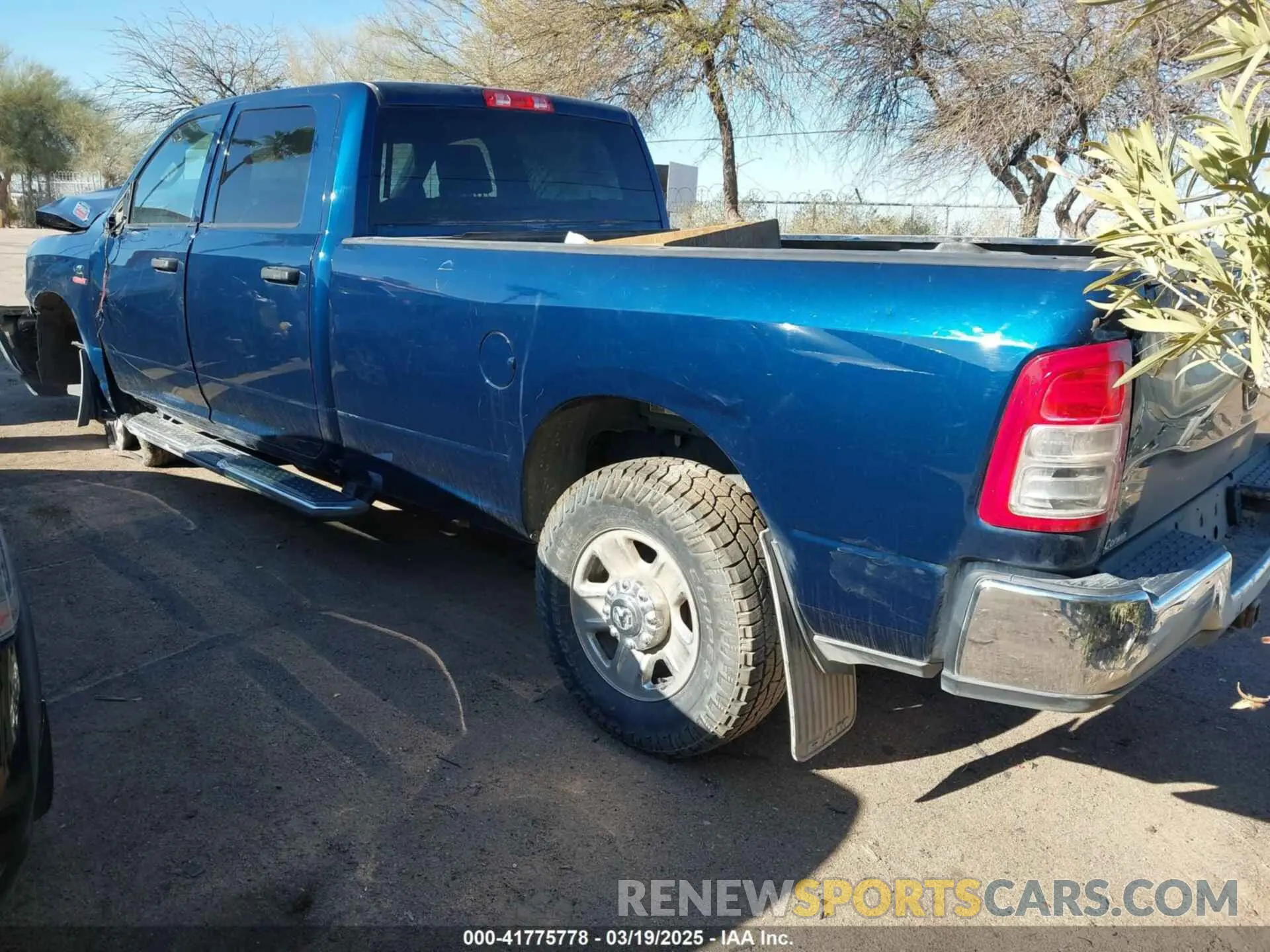 3 Photograph of a damaged car 3C63R2GL3PG533536 RAM 3500 2023
