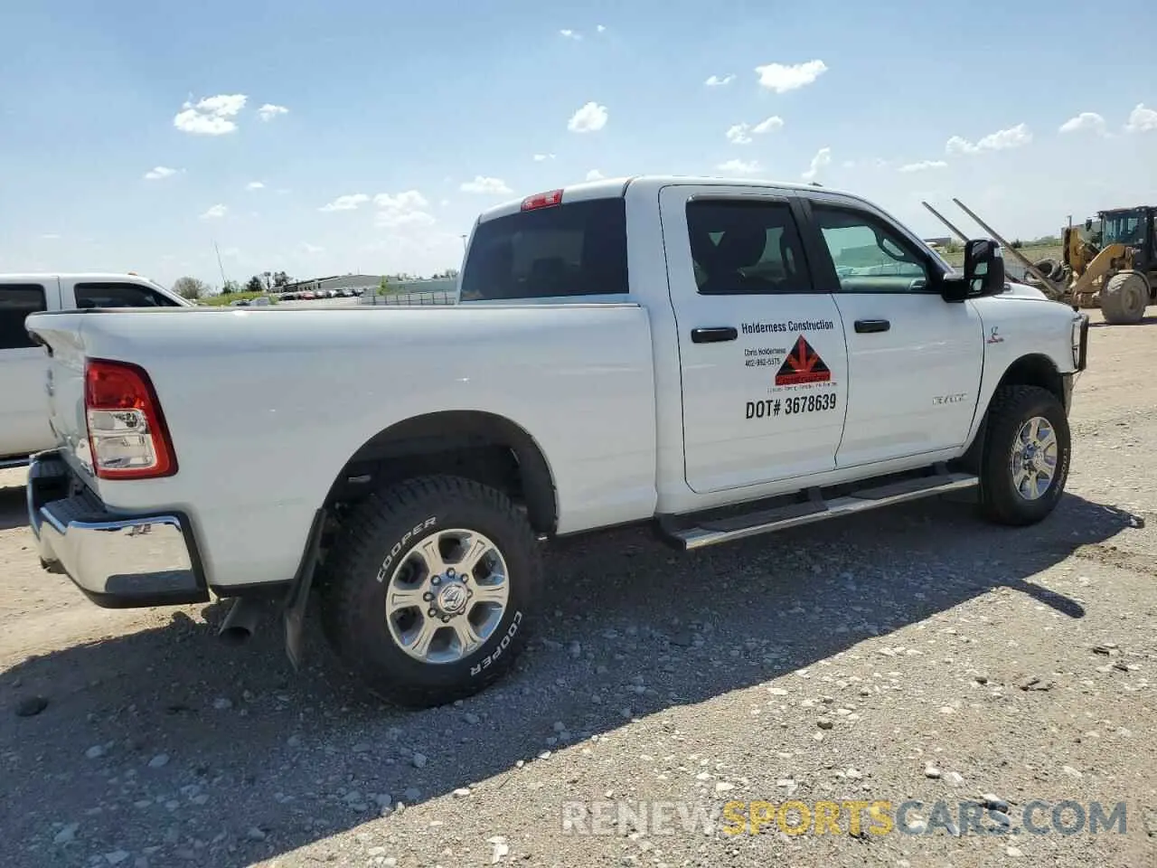 3 Photograph of a damaged car 3C63R3DL3PG596503 RAM 3500 2023