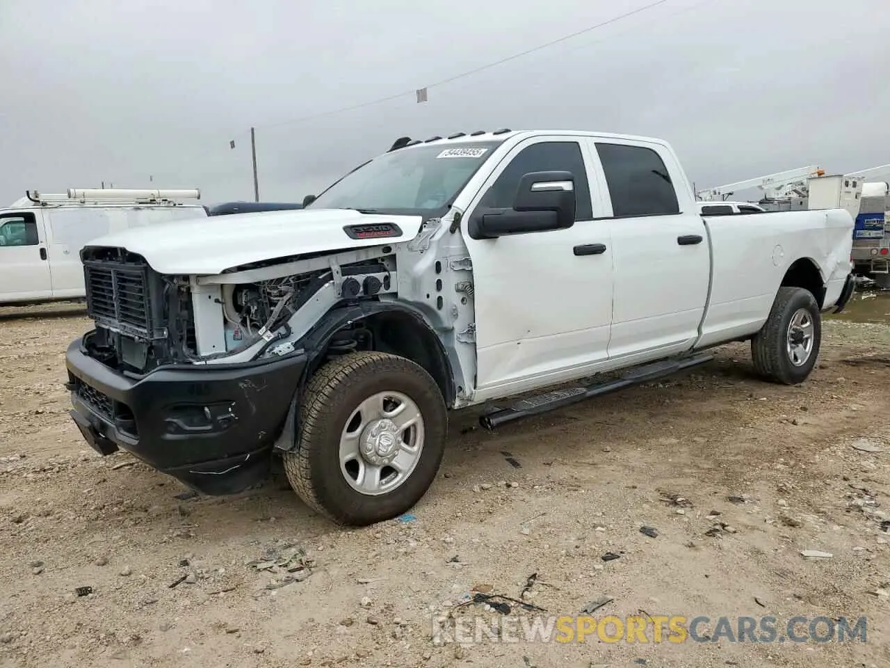 1 Photograph of a damaged car 3C63R3GJ0PG542084 RAM 3500 2023