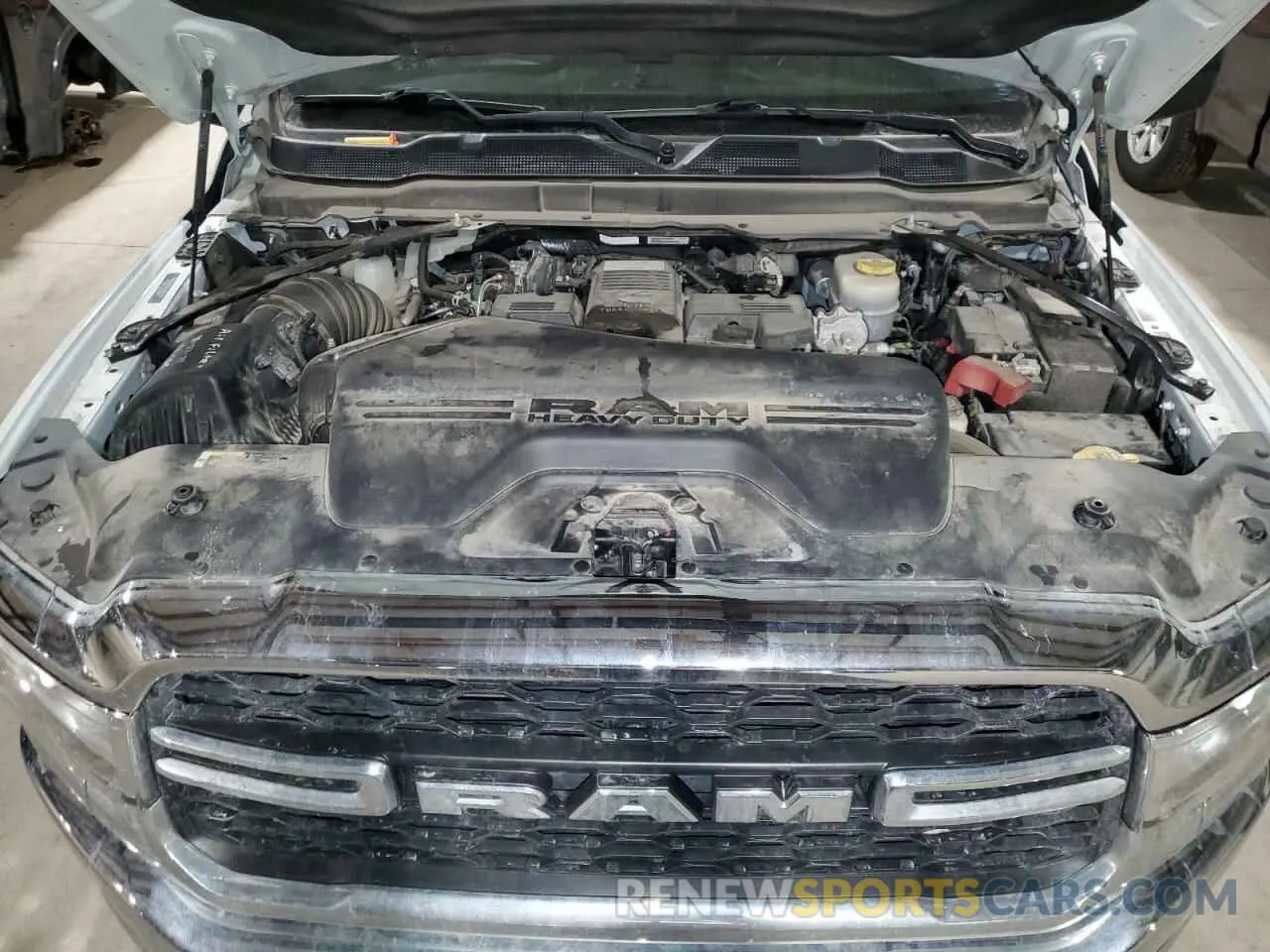 11 Photograph of a damaged car 3C63R3GL6PG545959 RAM 3500 2023