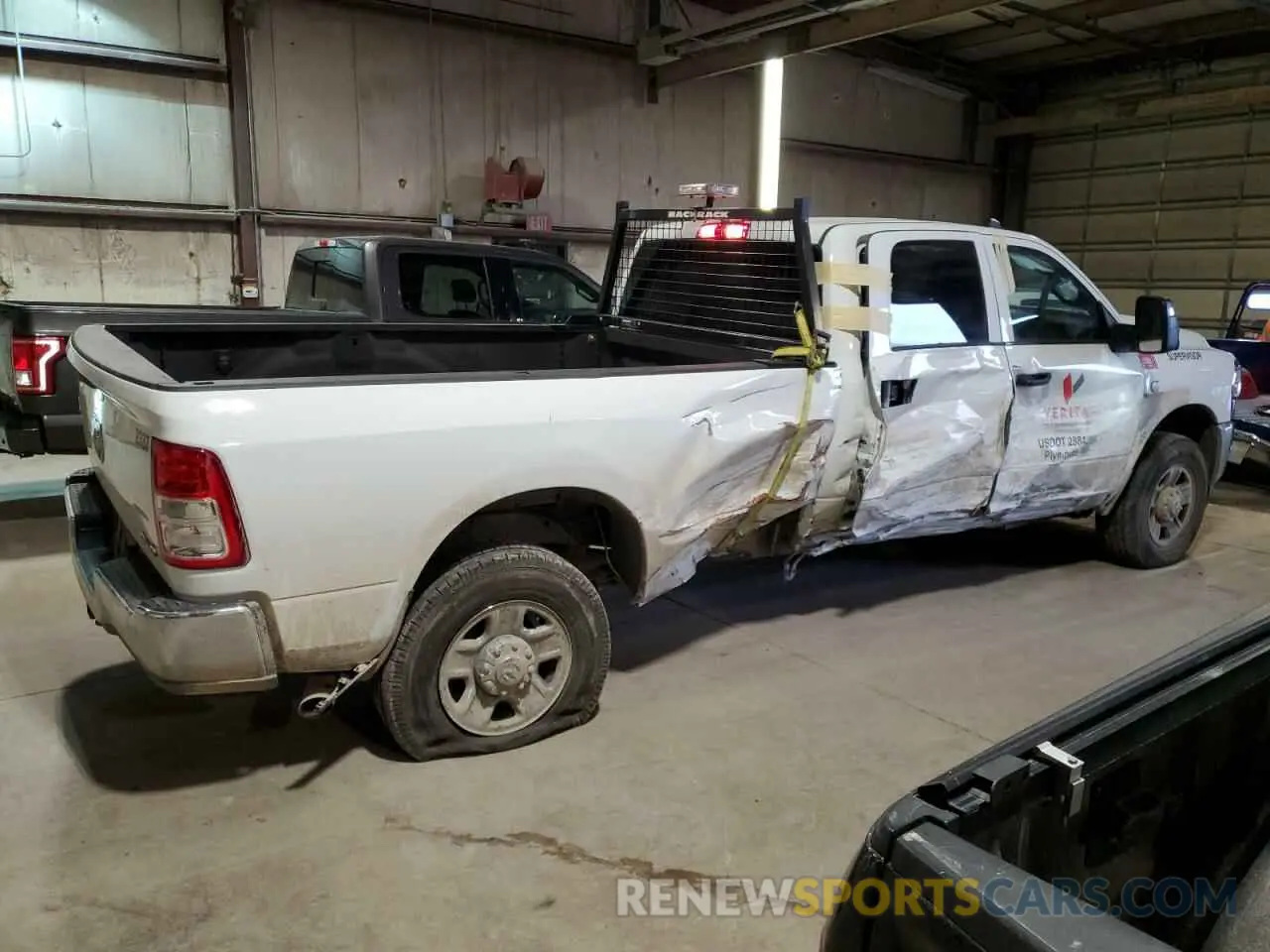 3 Photograph of a damaged car 3C63R3GL6PG545959 RAM 3500 2023