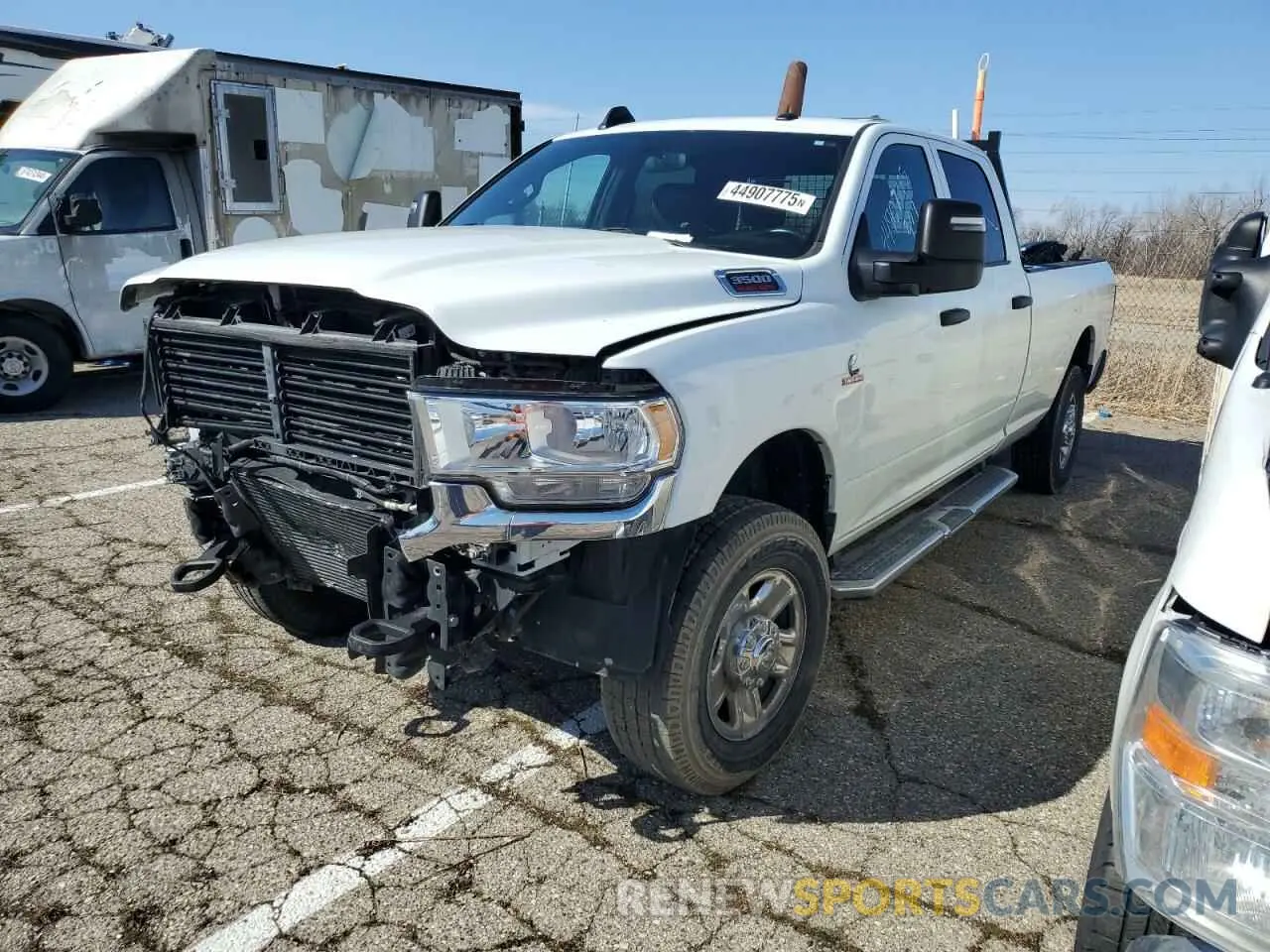 1 Photograph of a damaged car 3C63R3GL9PG545969 RAM 3500 2023