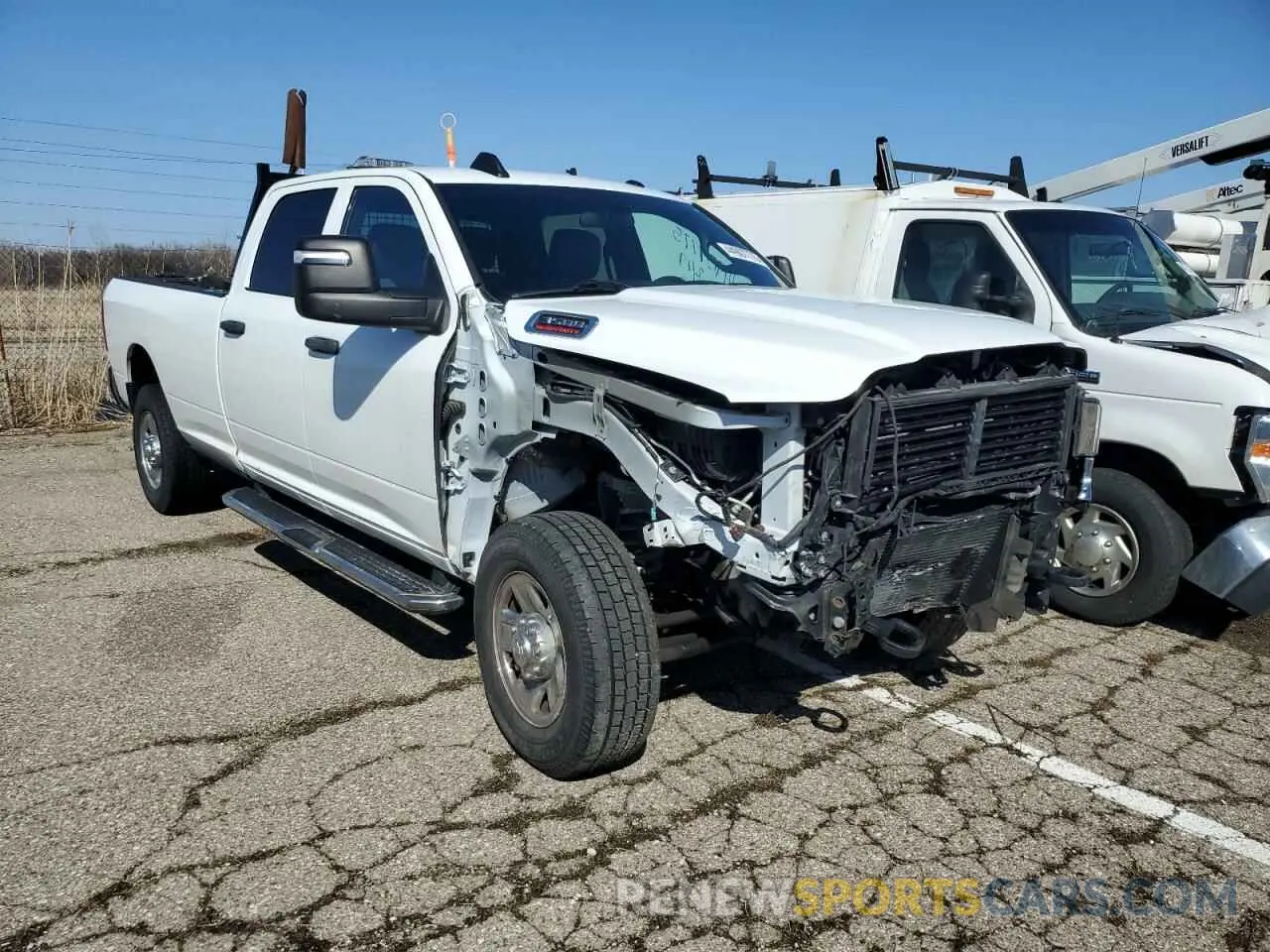 4 Photograph of a damaged car 3C63R3GL9PG545969 RAM 3500 2023