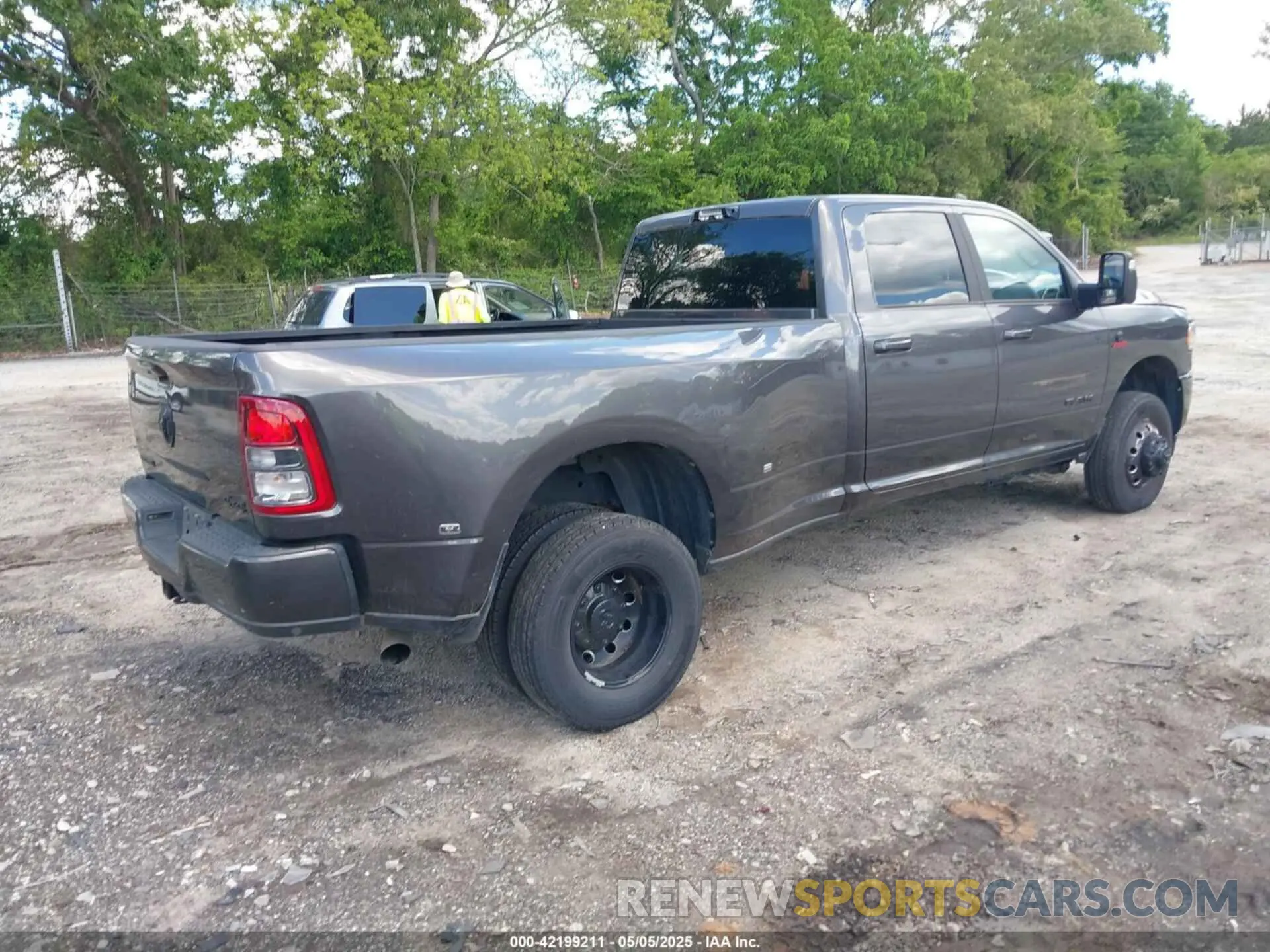 4 Photograph of a damaged car 3C63RRHL0PG542718 RAM 3500 2023