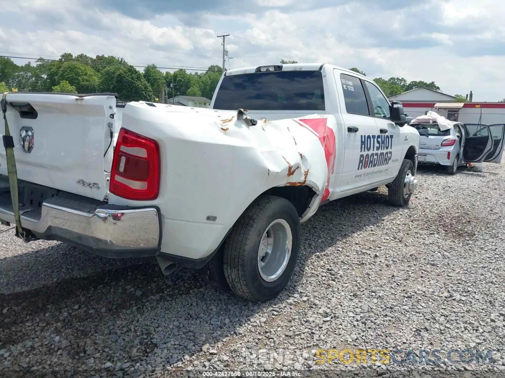 11 Photograph of a damaged car 3C63RRHL5PG624704 RAM 3500 2023